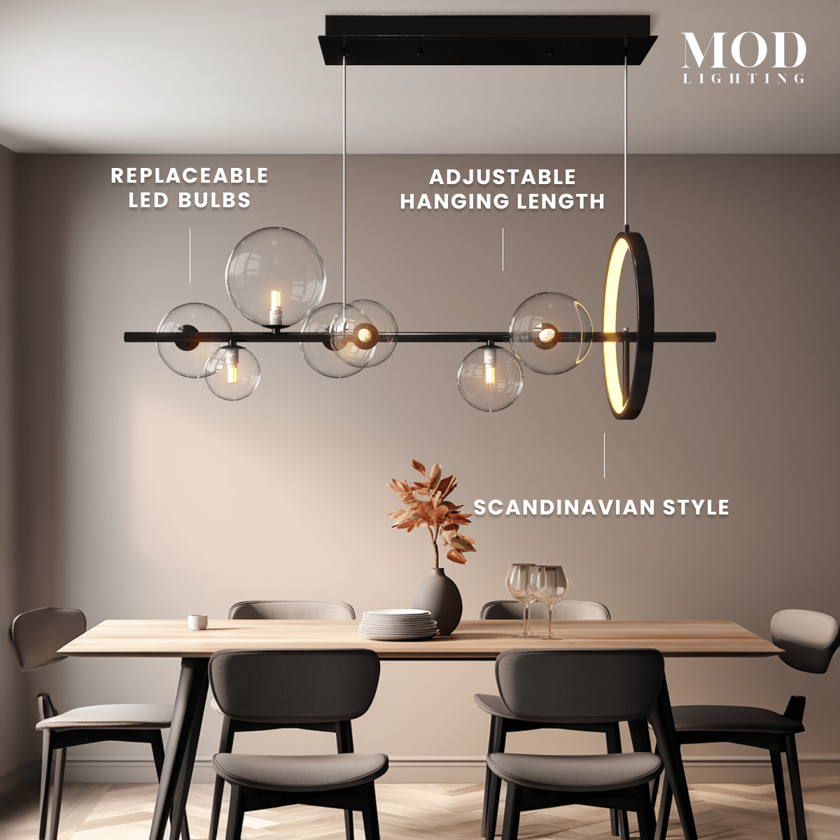 Bailey chandelier, black linear bar with clear glass orbs and a gold ring, over a dining table