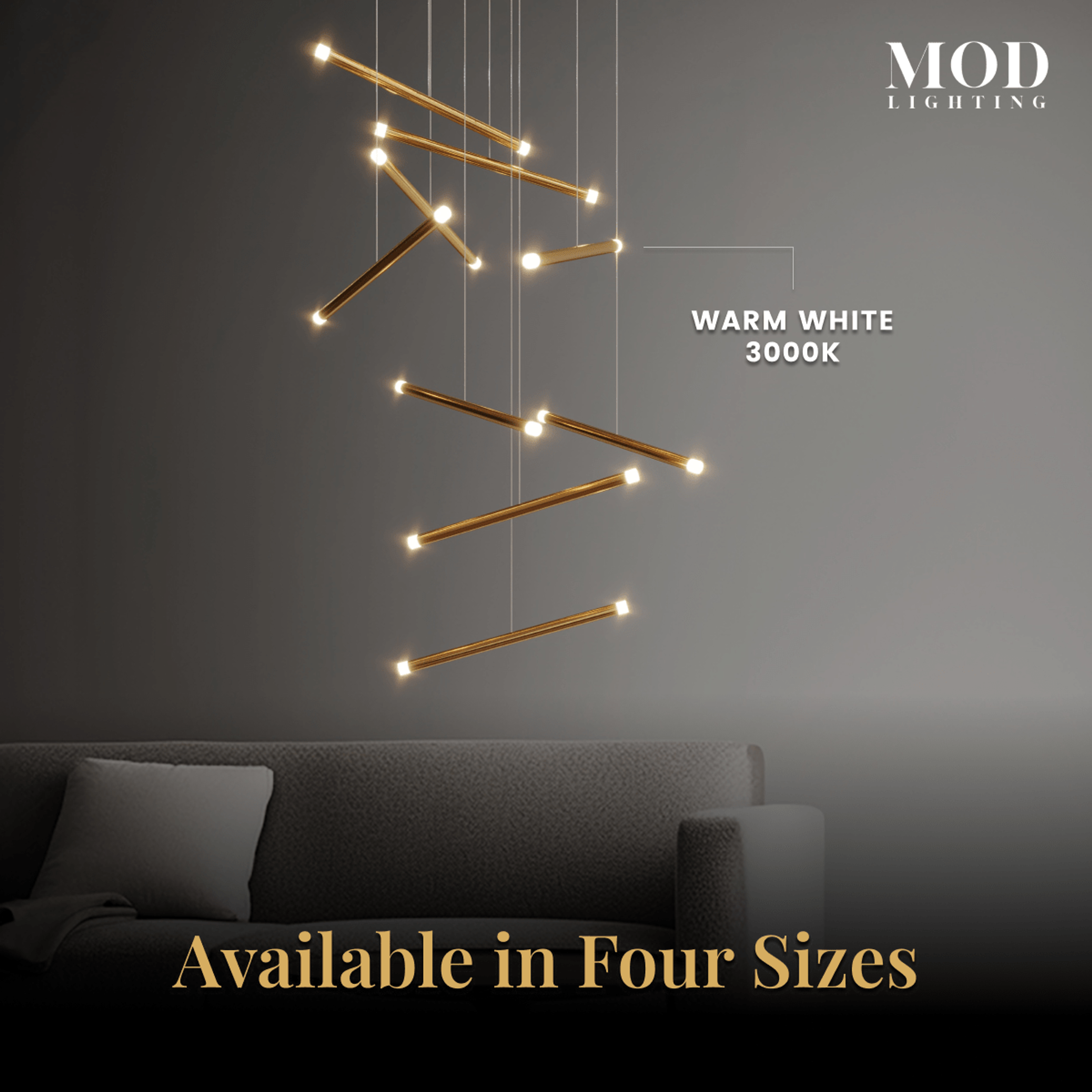 Freya gold cascading light-bar chandelier in warm white 3000K over a sofa, available in four sizes
