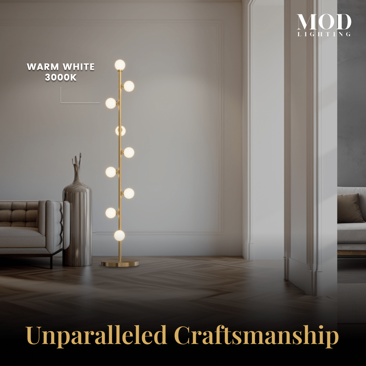 Pearl floor lamp in gold, warm white globes lit, standing on a wood floor in a neutral room