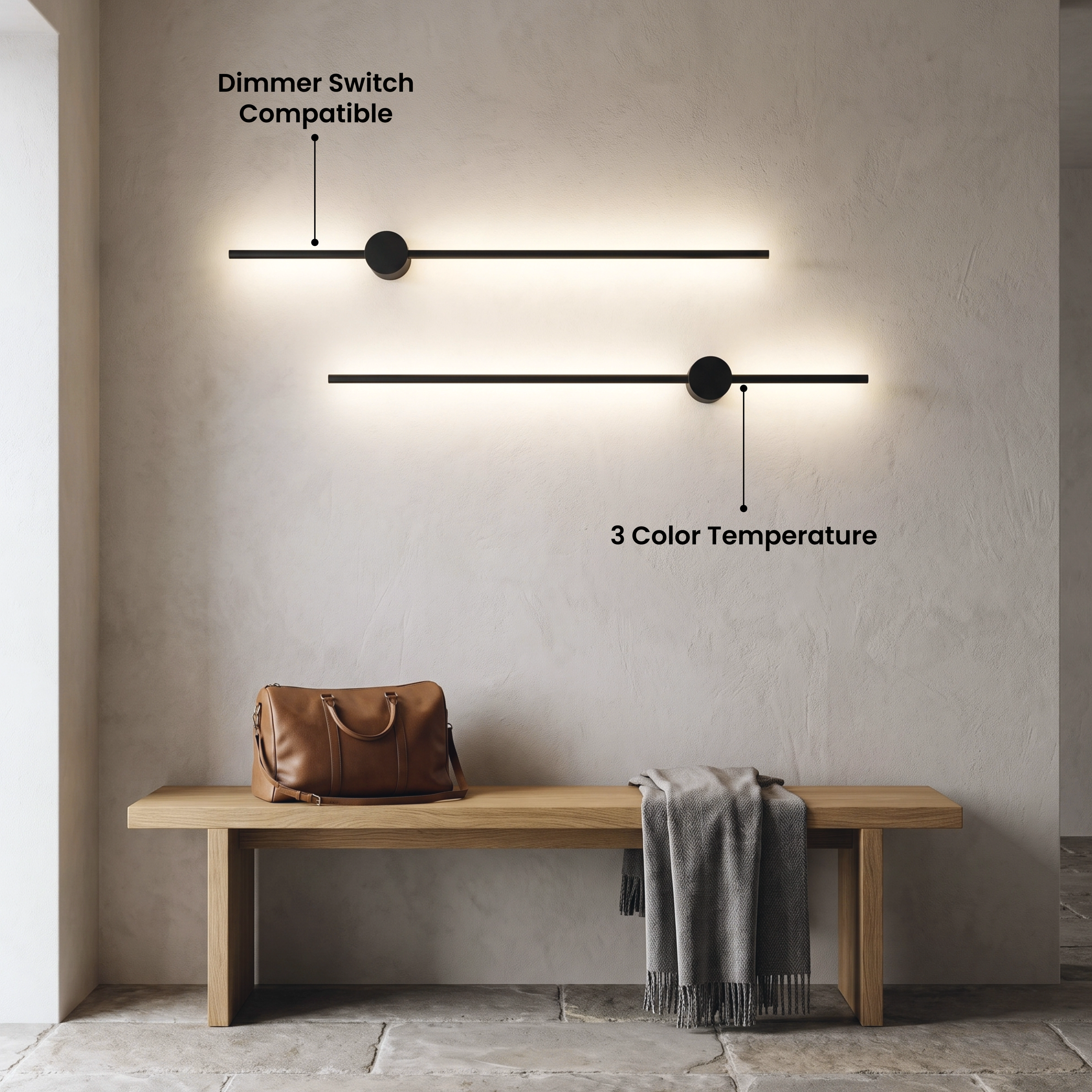 Cadel wall light in black finish, two pivoting linear bars glowing on a dark wall above a console