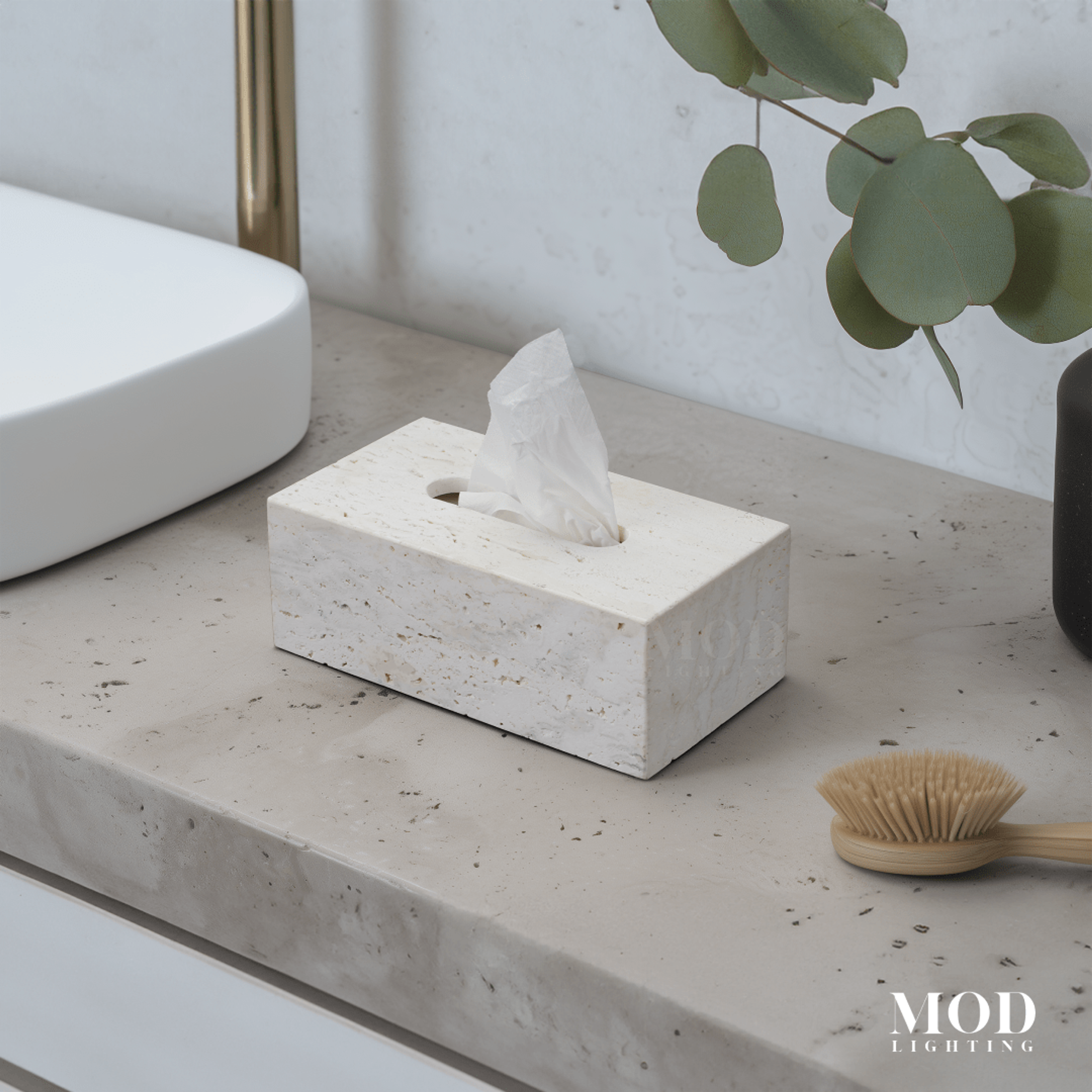 Alabaster Travertine Stone Tissue Box, cream stone rectangular cover, on a concrete vanity beside a basin and eucalyptus