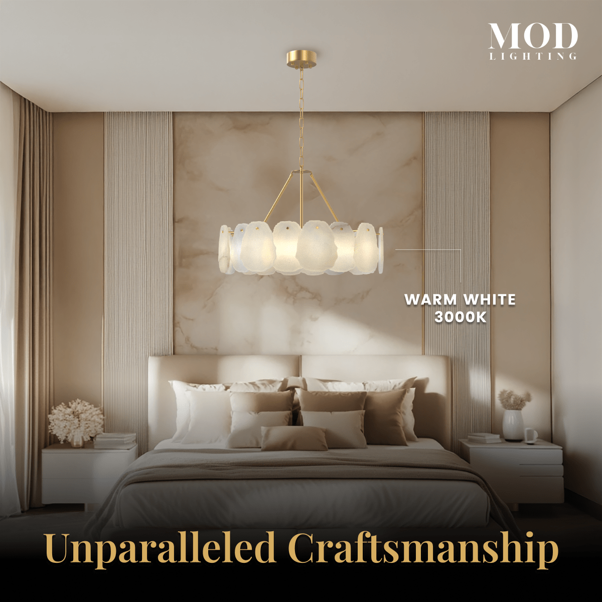 Alba gold and alabaster petal drum chandelier casting warm white light above a bed