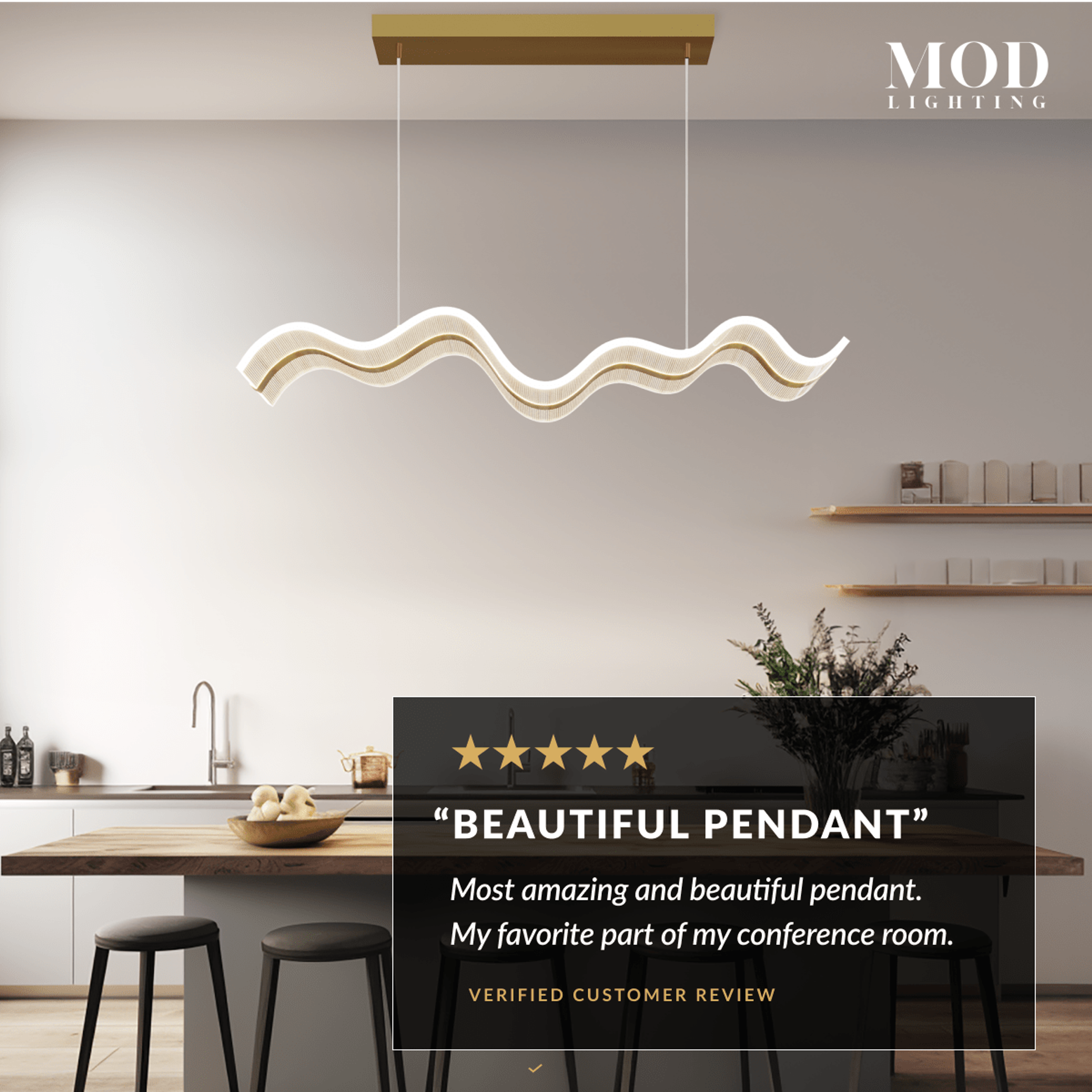 Ribbon gold and frosted wave-form LED pendant in a modern kitchen beside a five-star customer review card