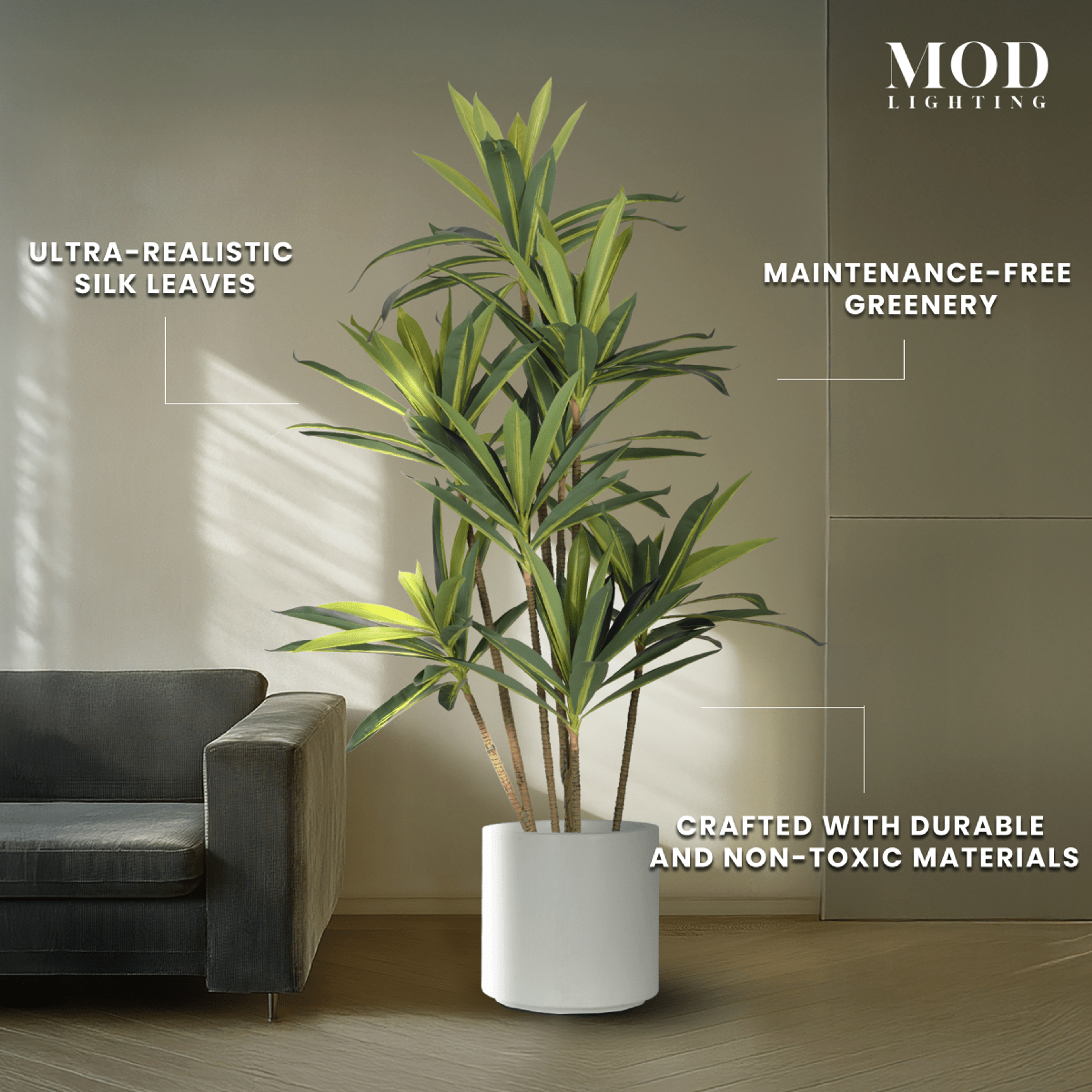 Dracaena artificial plant, slim arching leaves in a white pot by a sofa, with silk-leaf and non-toxic-material callouts