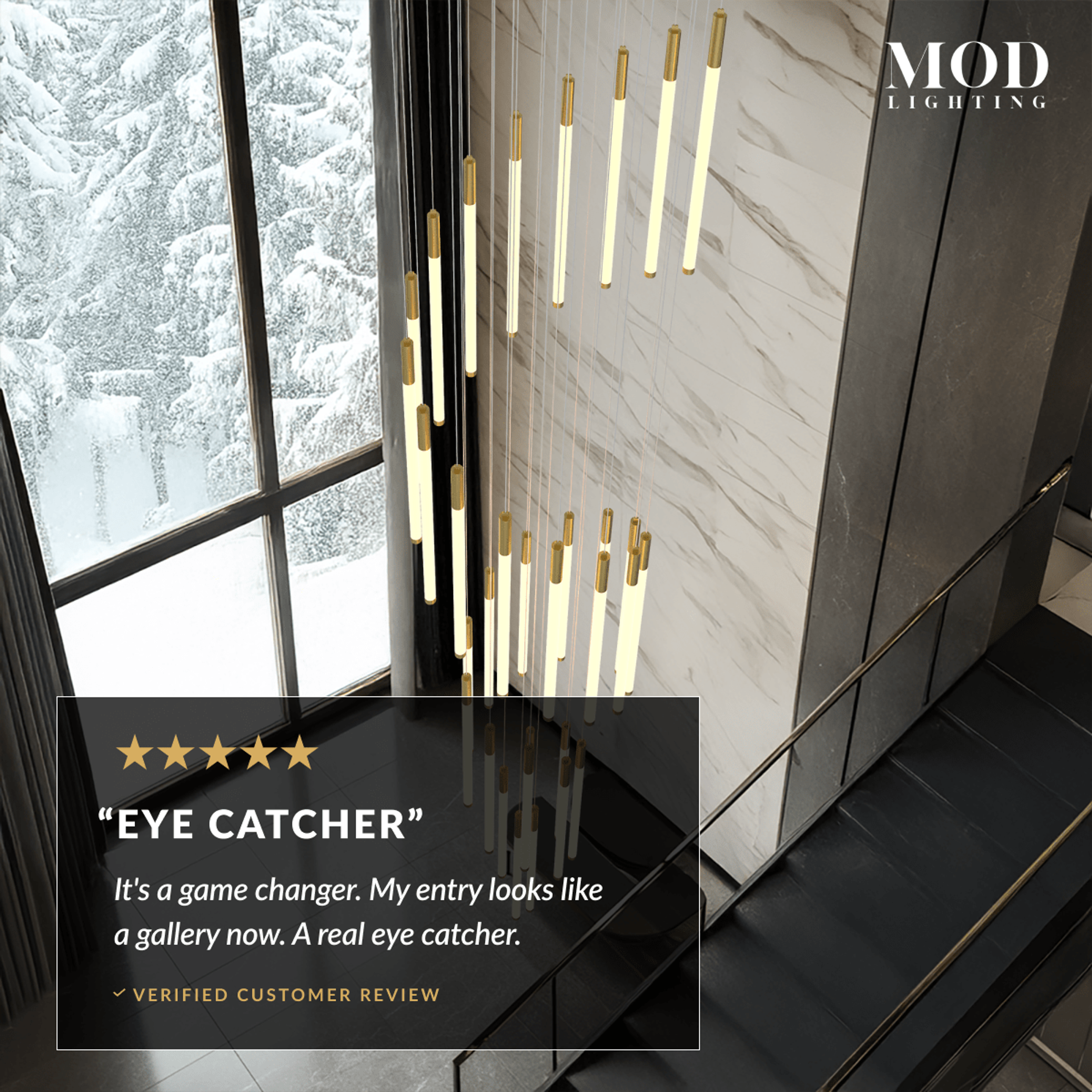 Kasper gold cascade chandelier of vertical LED bars beside a marble stairwell, five-star review overlay
