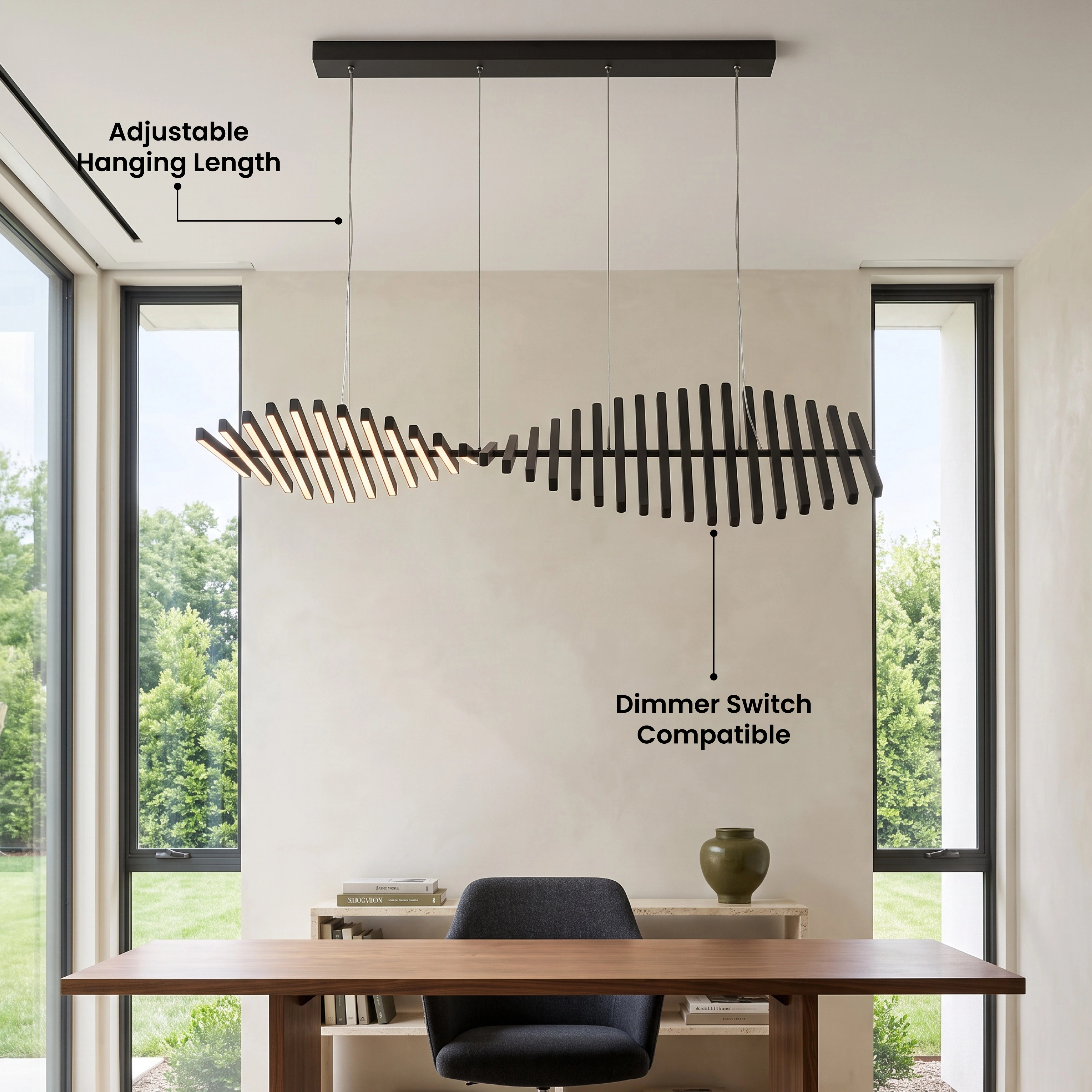 Sylas pendant, black light-bar spindle form suspended over a kitchen island