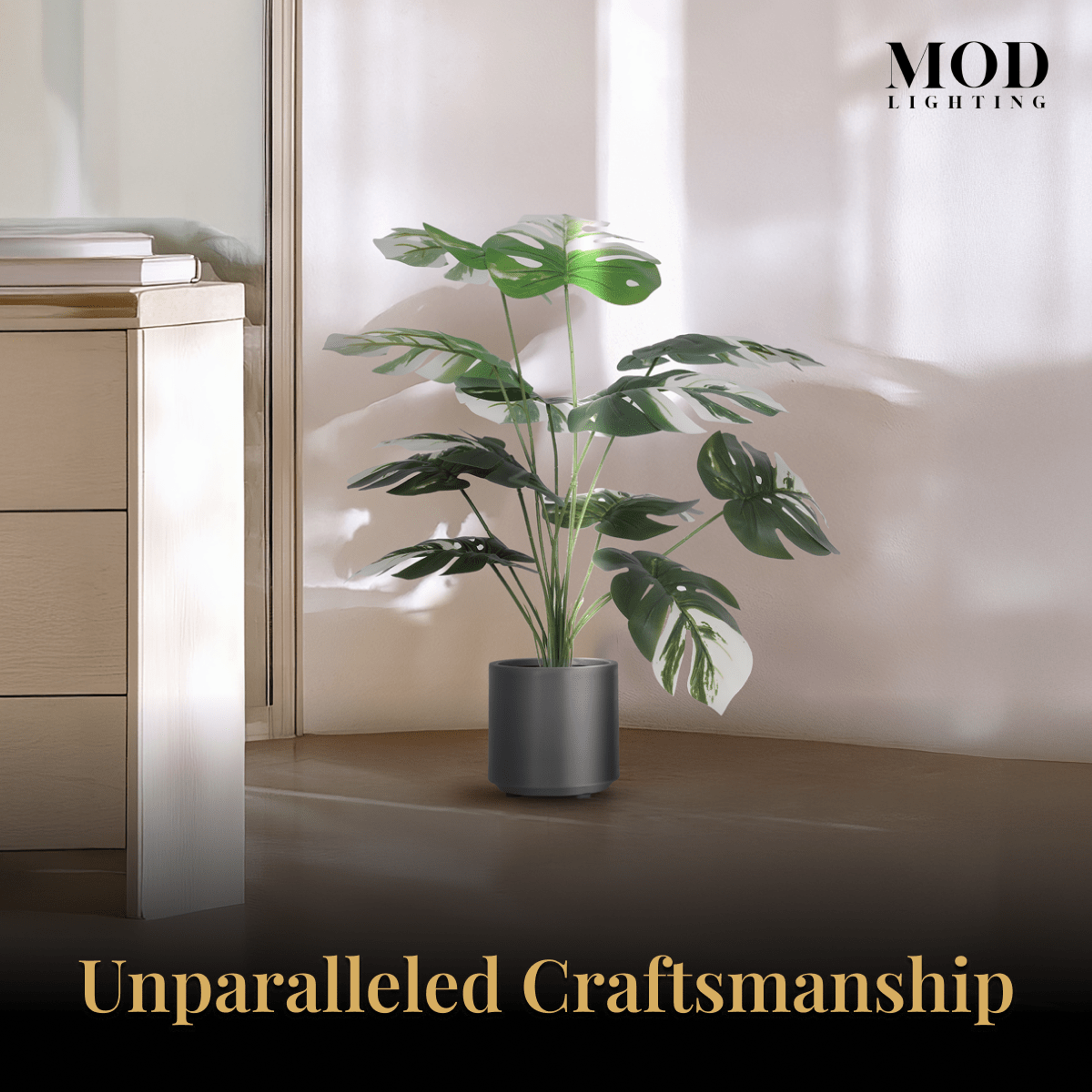 Monstera Albo artificial plant, variegated leaves in a dark grey pot, titled Unparalleled Craftsmanship
