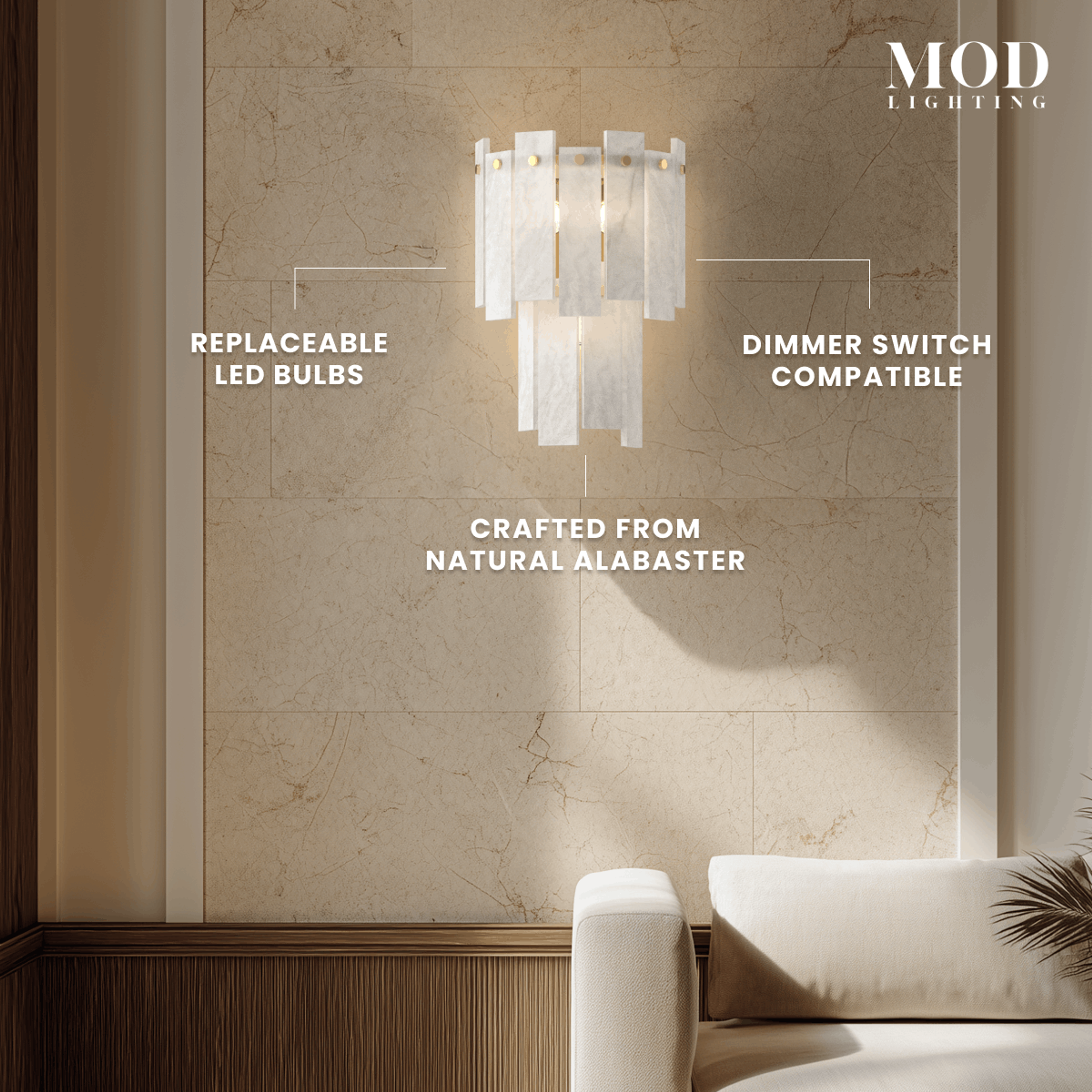 Velina Sconce gold wall light with layered white alabaster panels glowing on a neutral stone wall