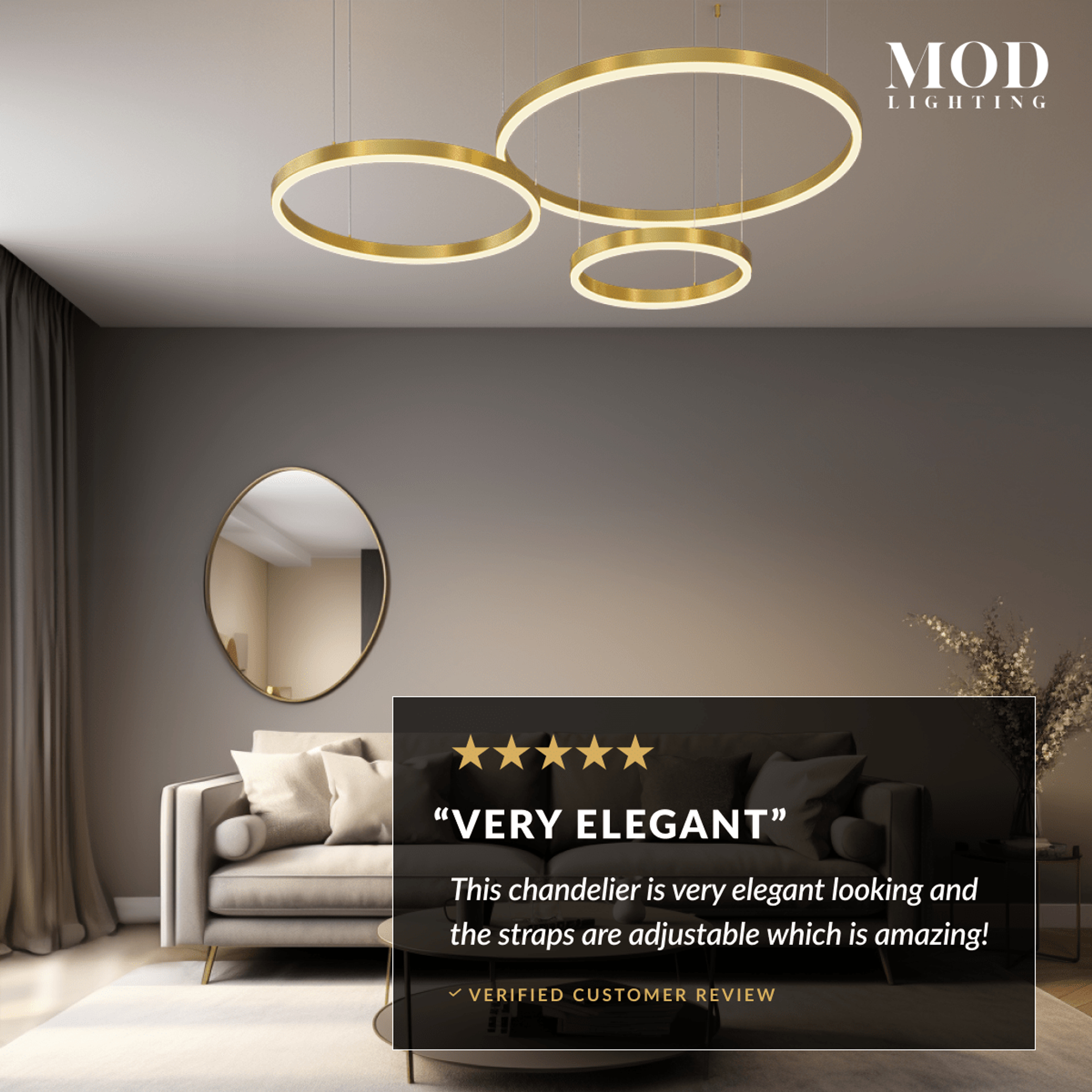 Charlotte chandelier, three gold LED rings hanging over a living room seating area