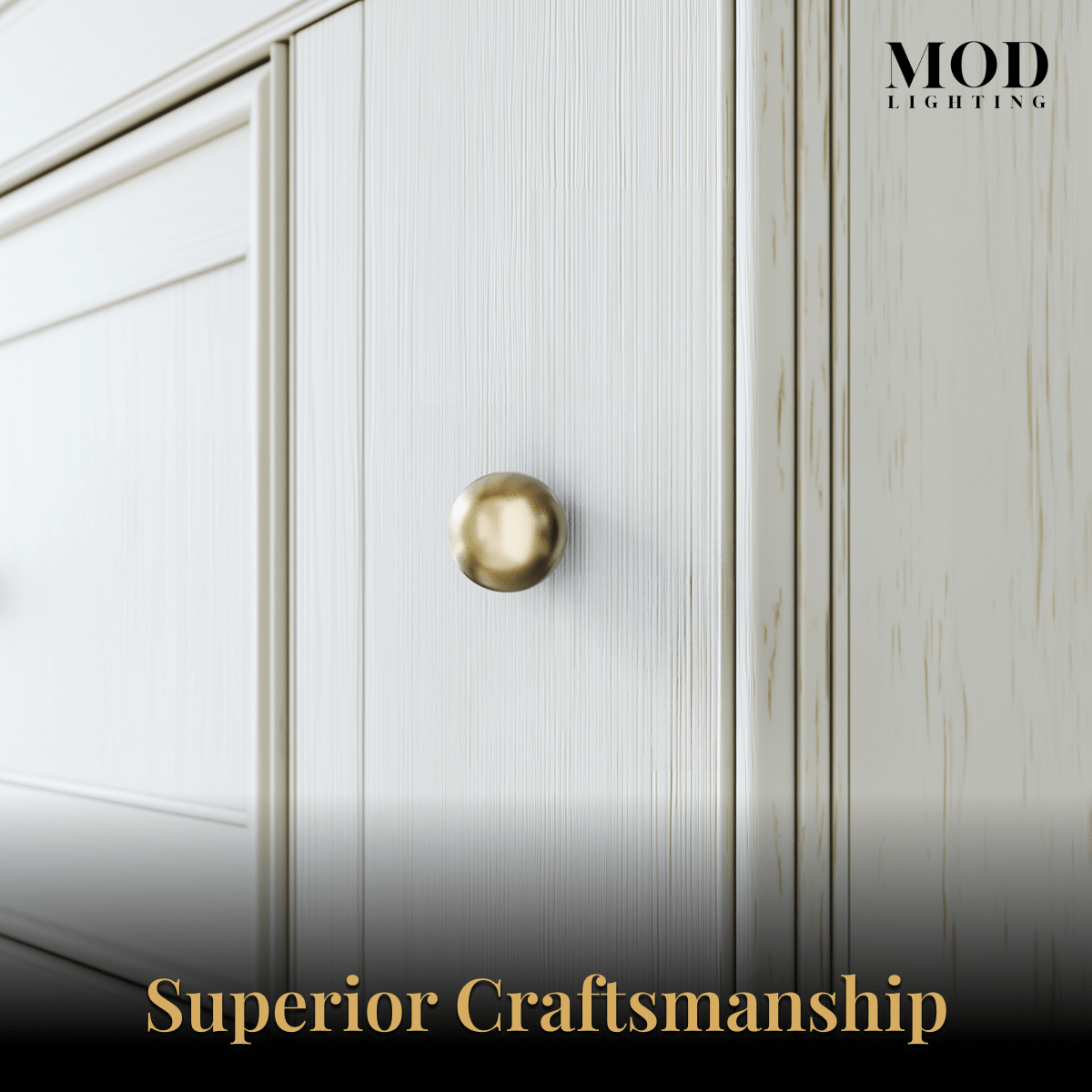 Rochelle brushed-gold spherical cabinet knobs on a cream four-drawer dresser in a warm styled bedroom