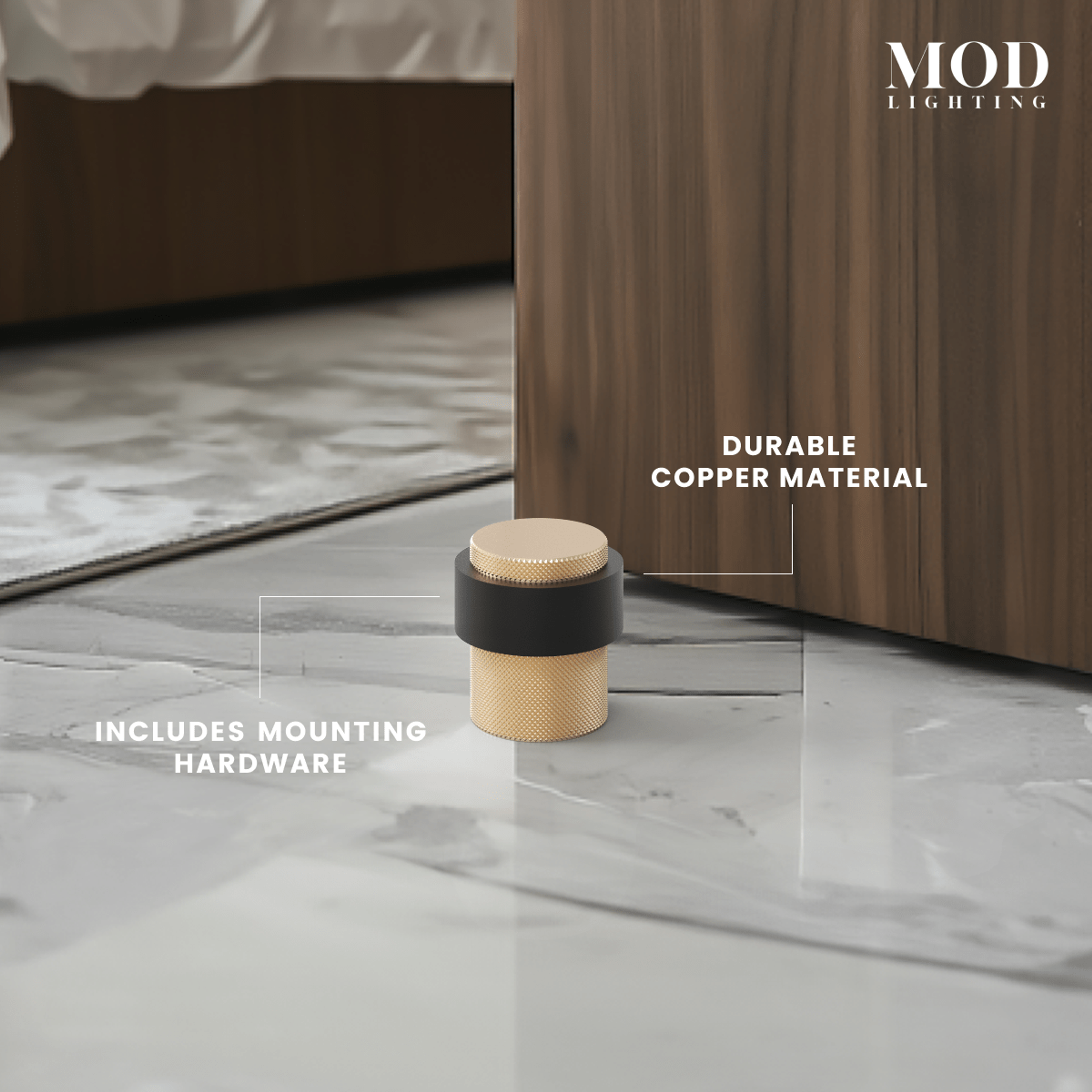 Enso brushed-gold and black copper door stop on marble floor beside a wood-panelled wall, with feature callouts