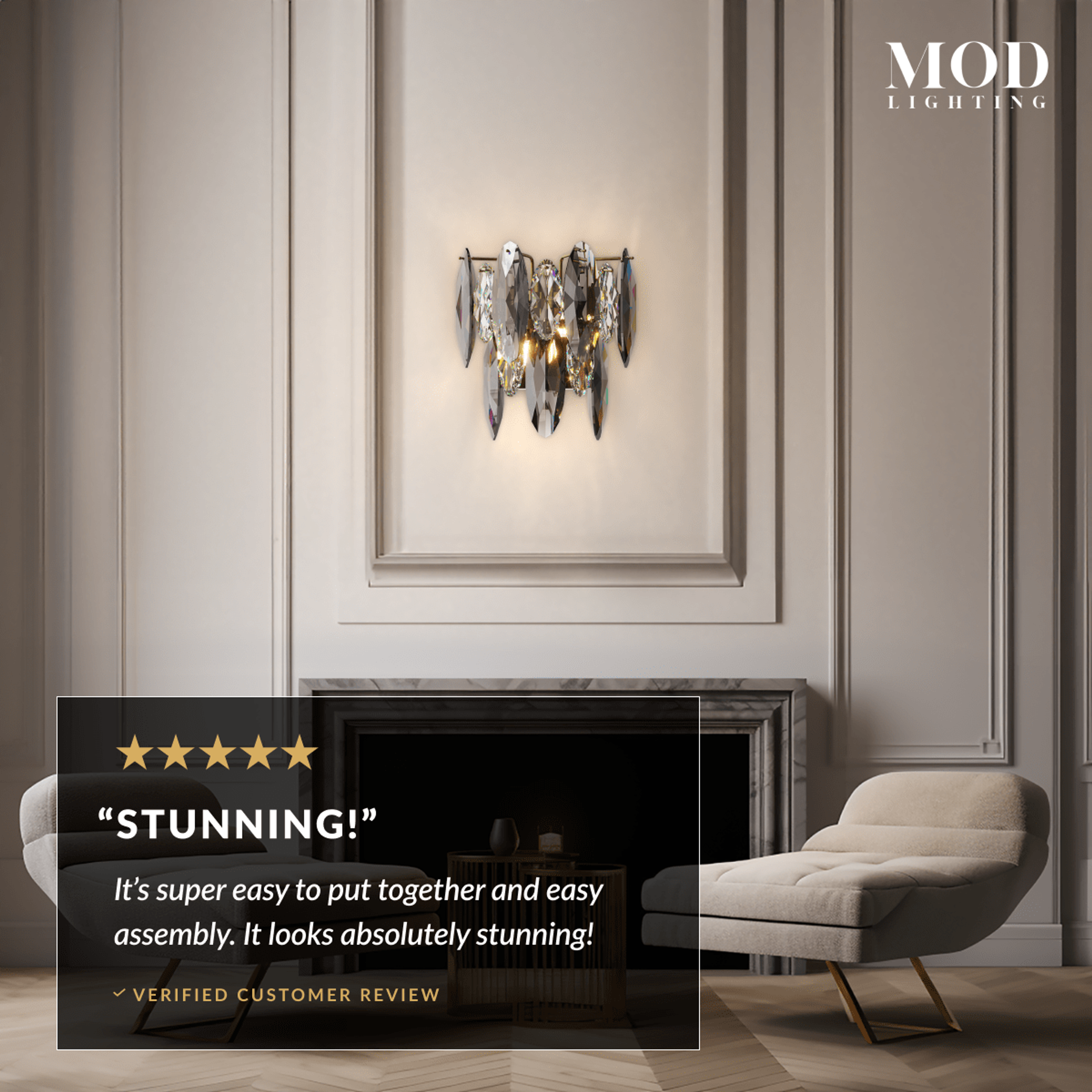 Celestial gold and smoke-crystal wall sconce on a panelled wall by a fireplace, customer review overlay