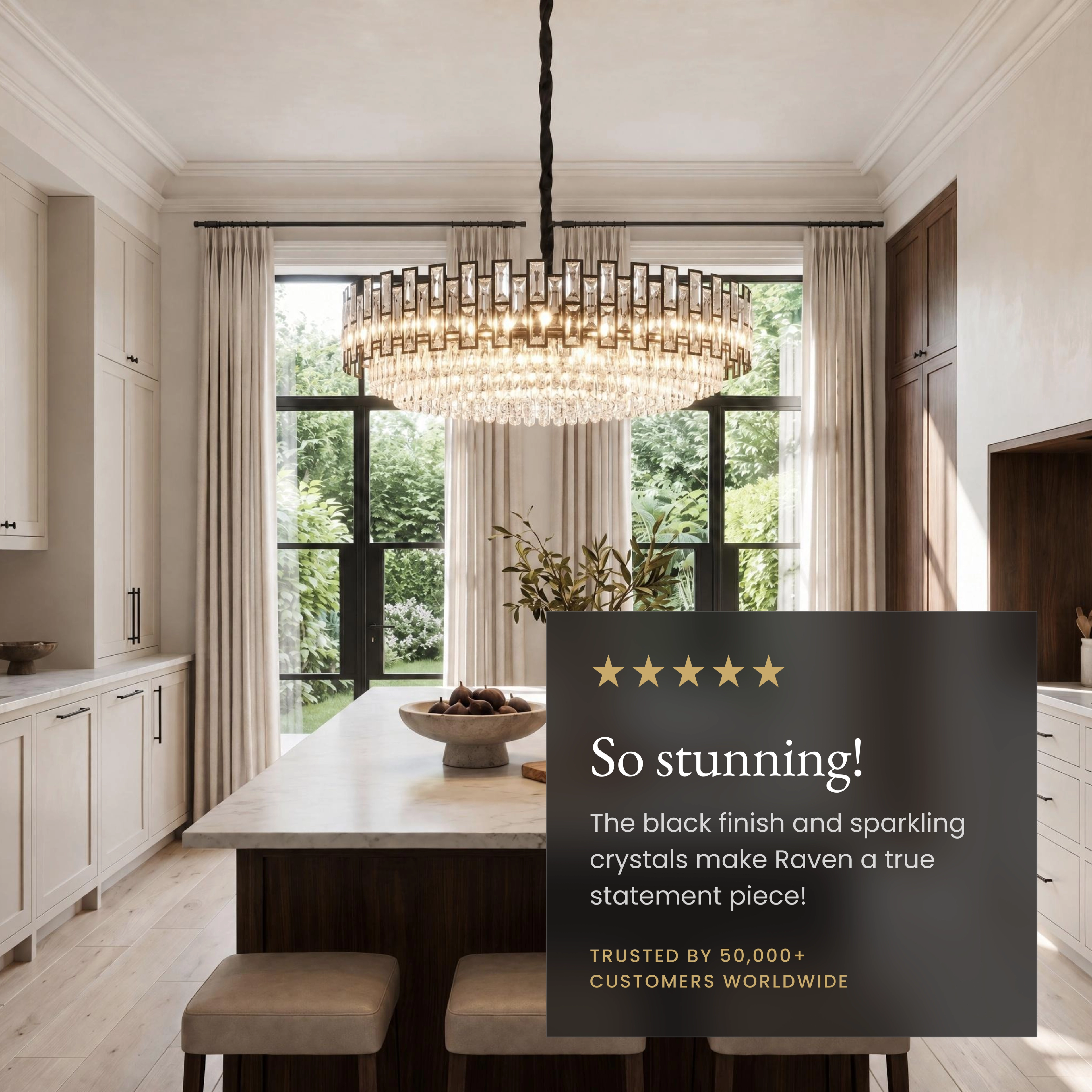 Raven black crystal chandelier over a curved sofa, callouts: dimmer, replaceable LED bulbs, adjustable chain