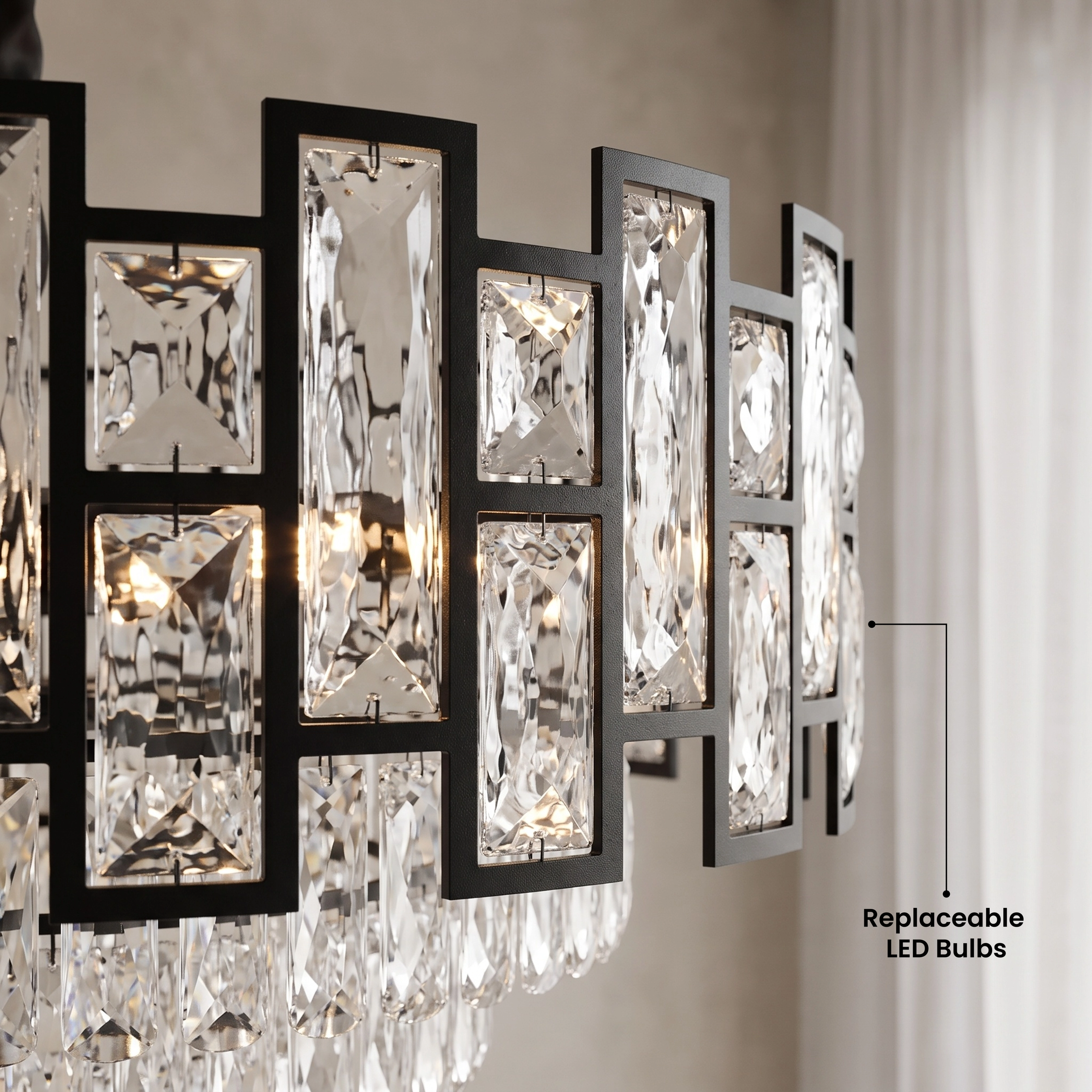 Raven black crystal chandelier in a dark living room, warm white 3000K, available in three sizes