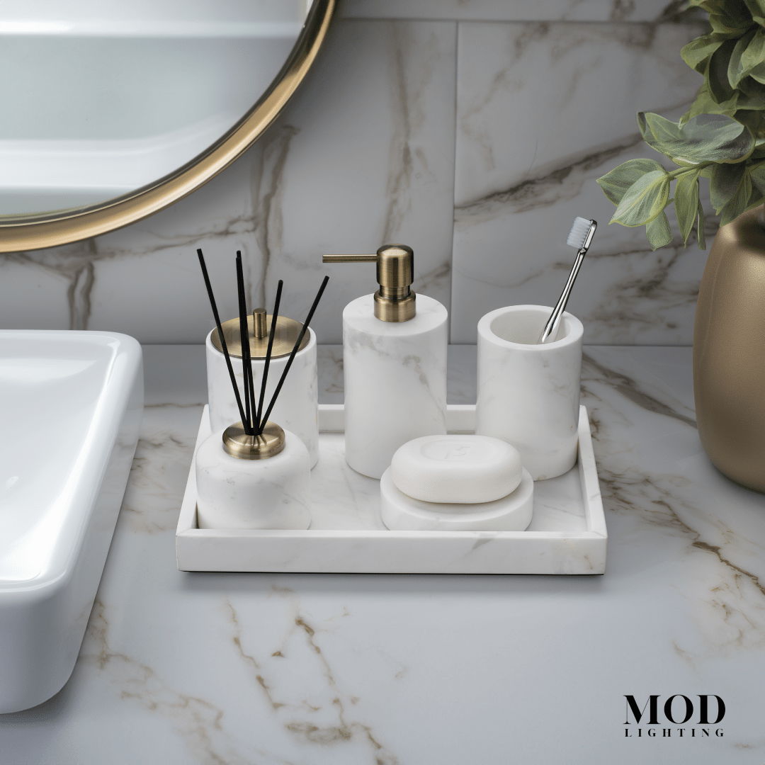 Jazz White Marble Bath Set, white marble accessories with gold accents on a marble tray in a marble-tiled bath