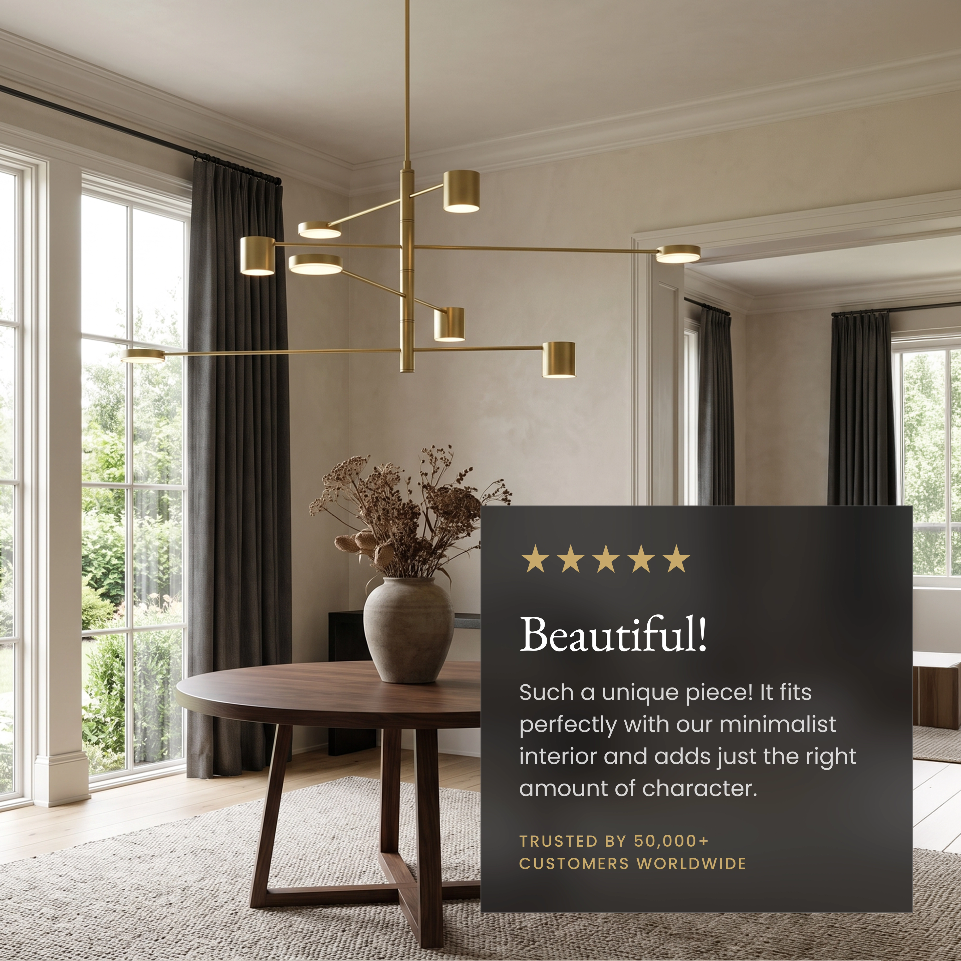 Lynx chandelier in black finish on a dark wall, radiating arms with disc shades over a grey sofa living room