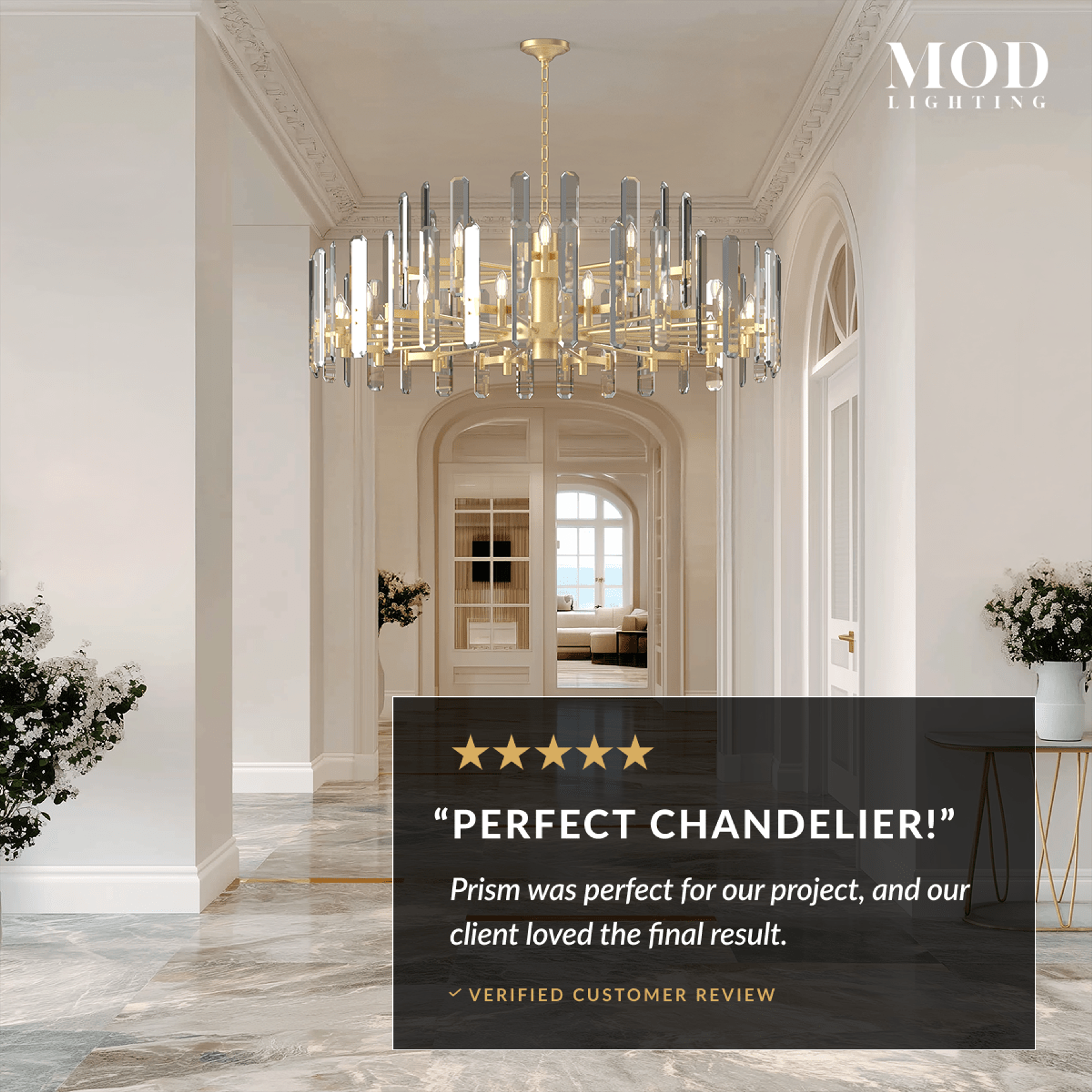 Prism brushed-gold drum chandelier with vertical faceted crystal bars in a bright arched hallway