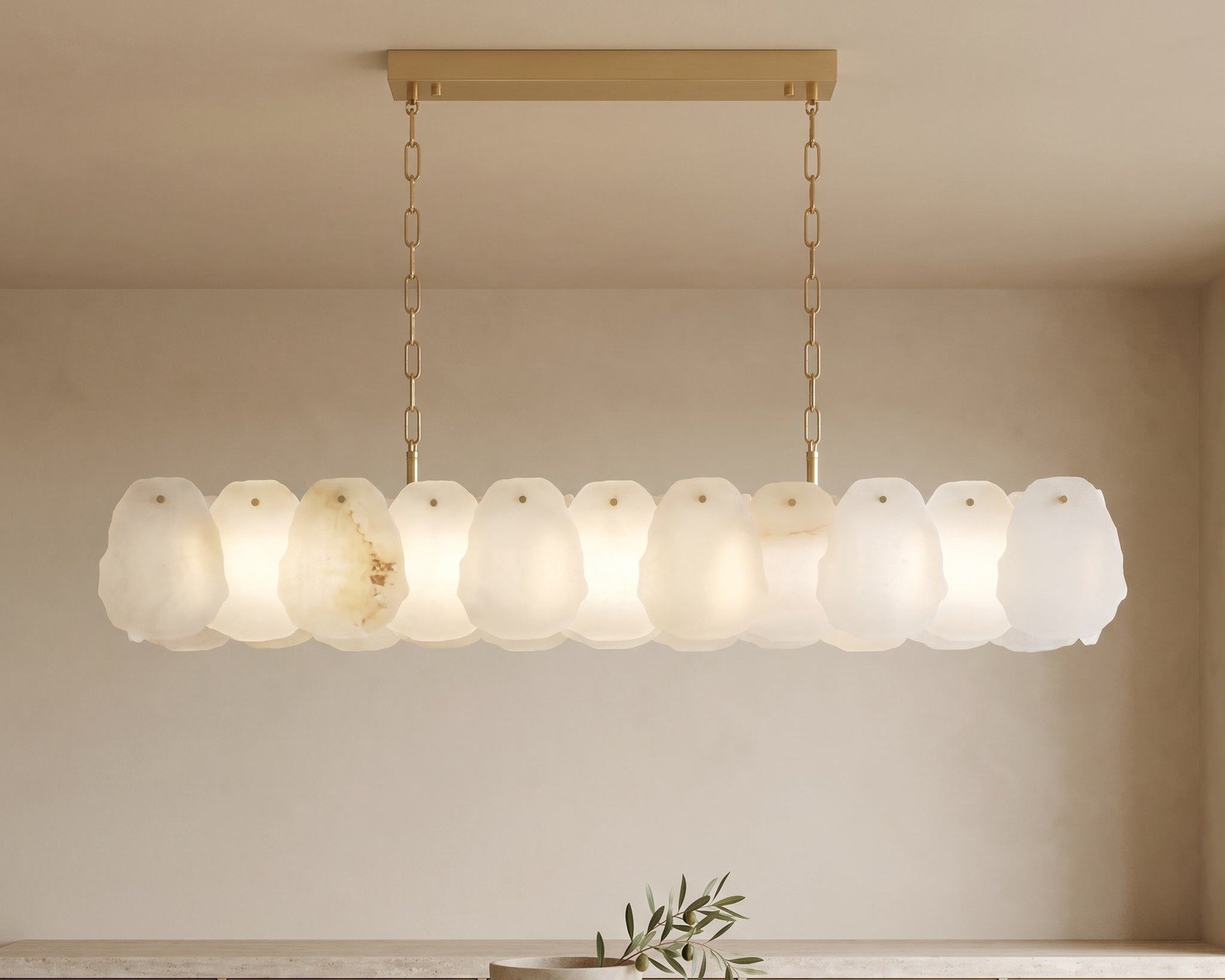 Alba Pendant, a linear alabaster pendant, above a kitchen island