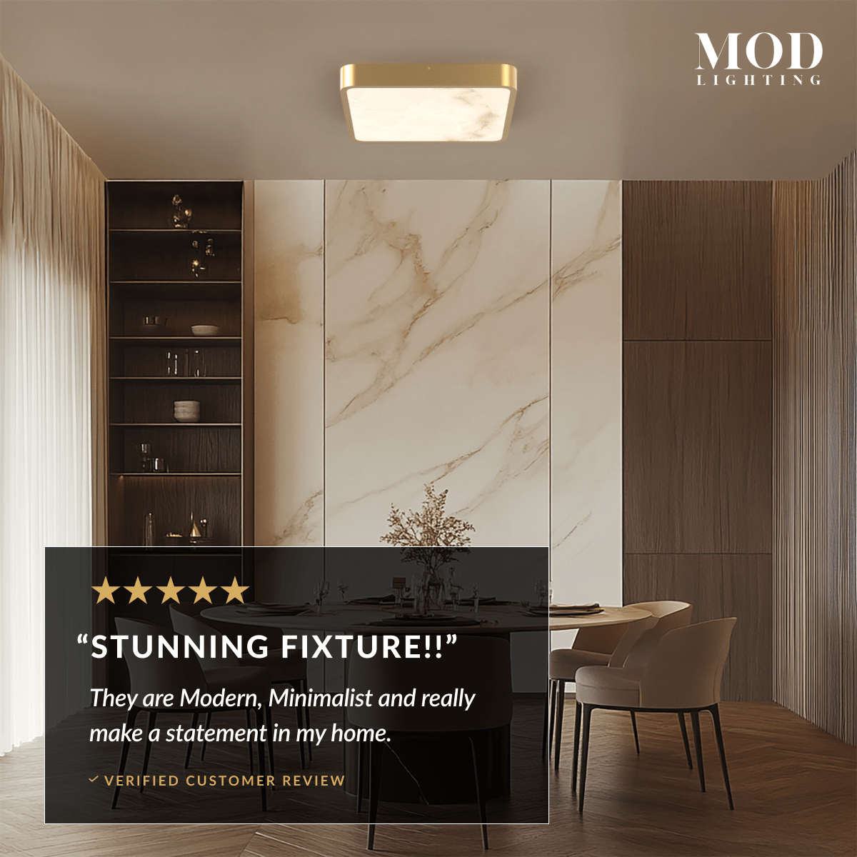 Selene gold square alabaster ceiling light on a wood ceiling above a marble-walled dining area