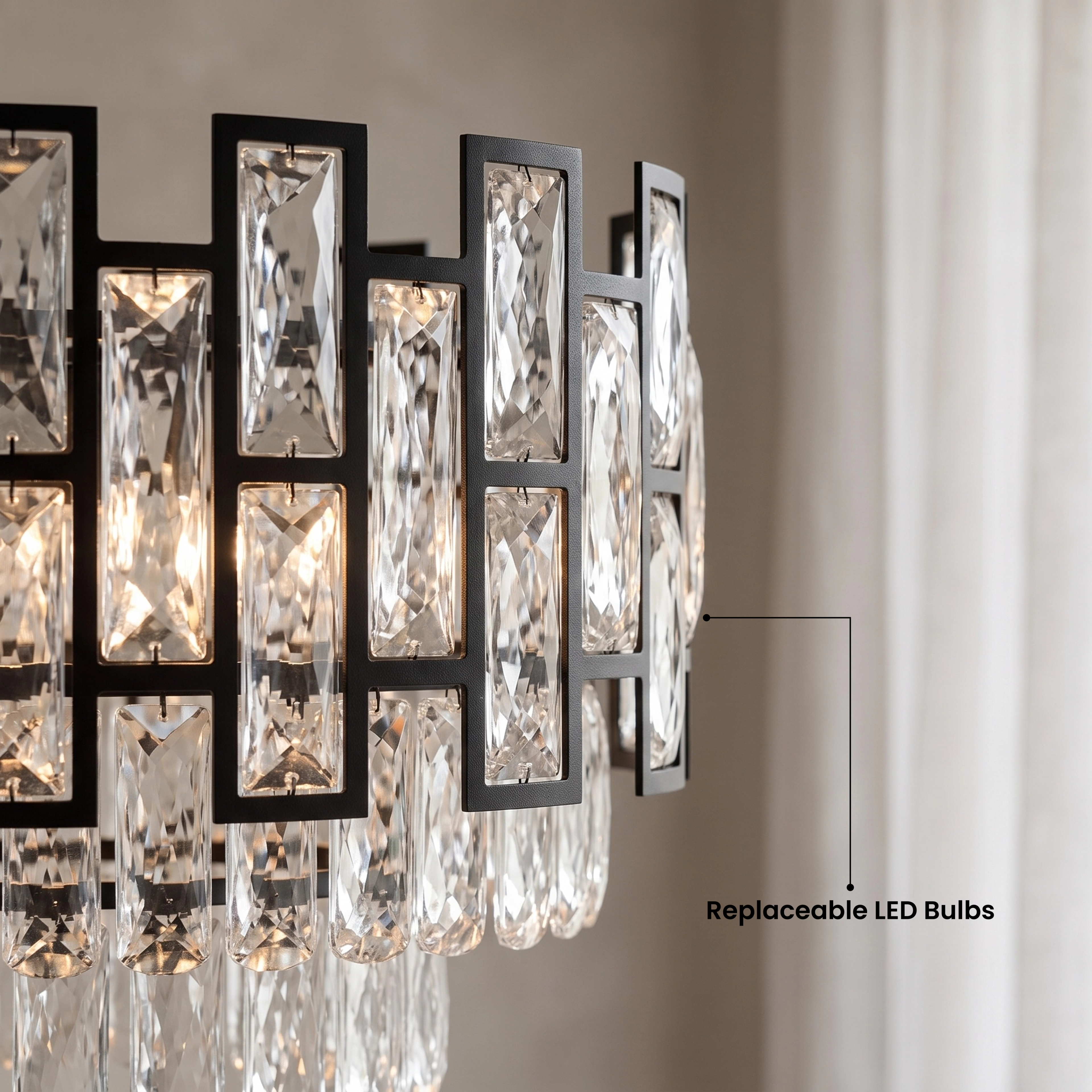 Raven black linear crystal pendant over a dining table, warm white 3000K, available in two sizes