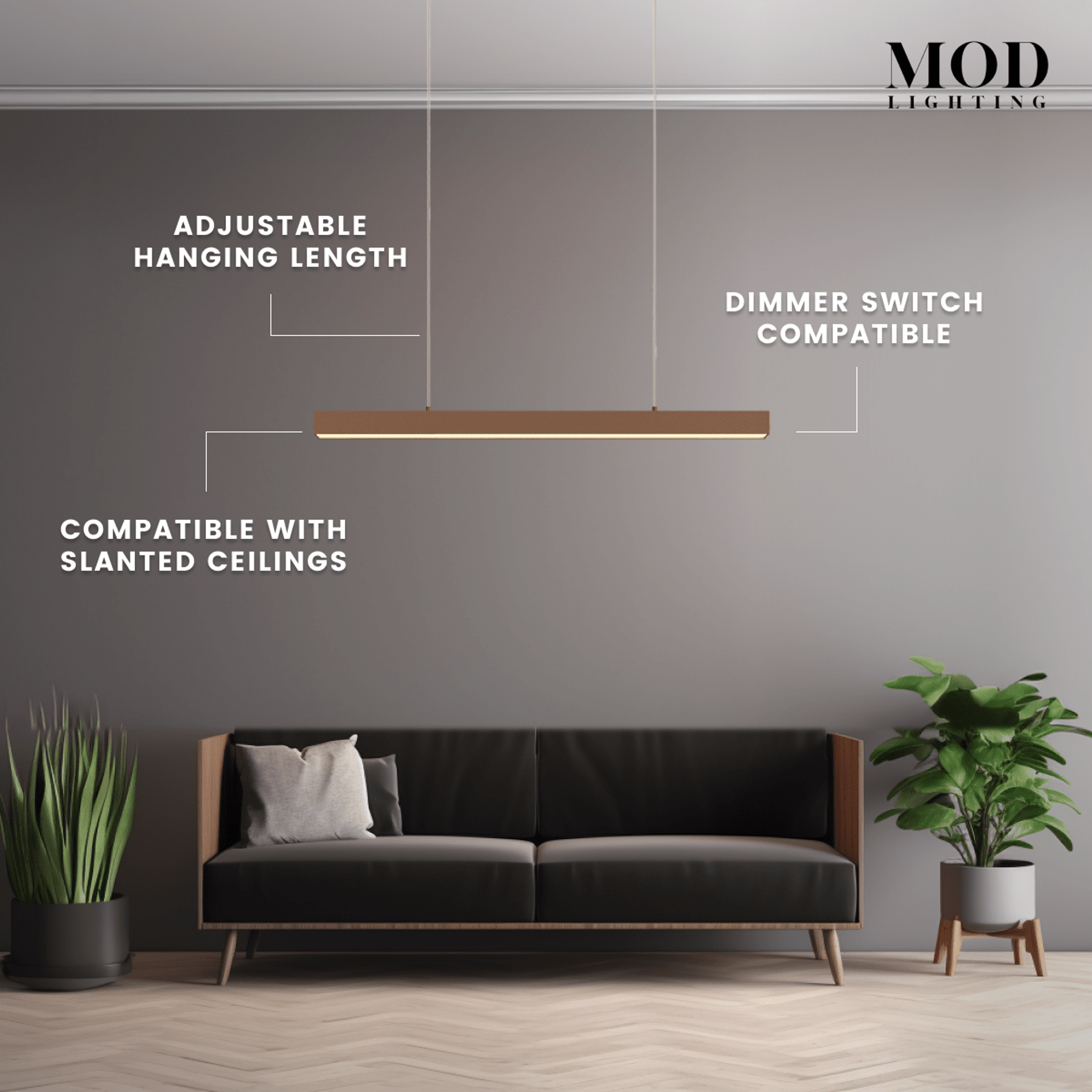 Luka pendant, slim copper linear bar lit warm, suspended above a sofa in a grey living room