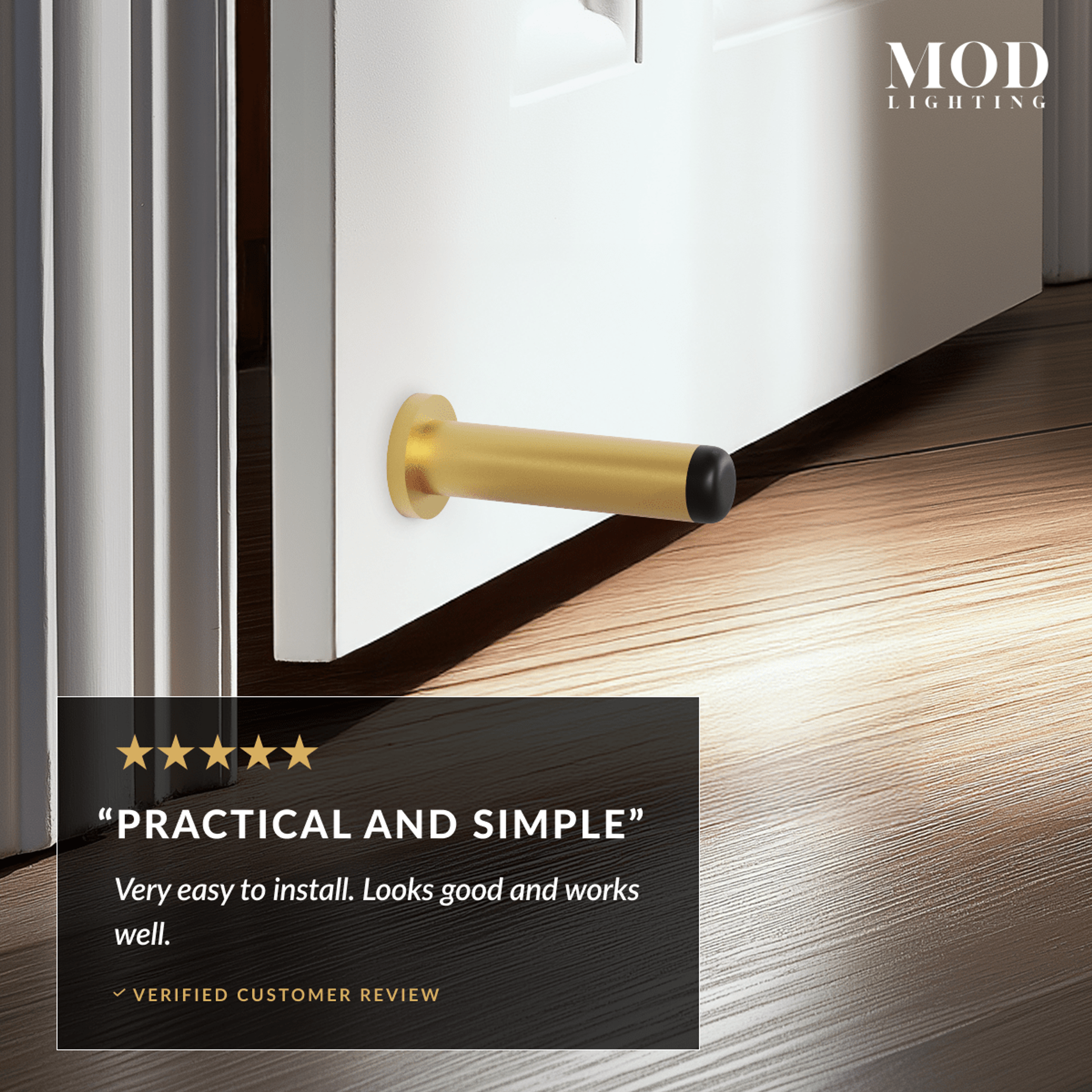 Aro brushed-gold wall-mounted door stop with rubber tip cushioning a door, five-star review