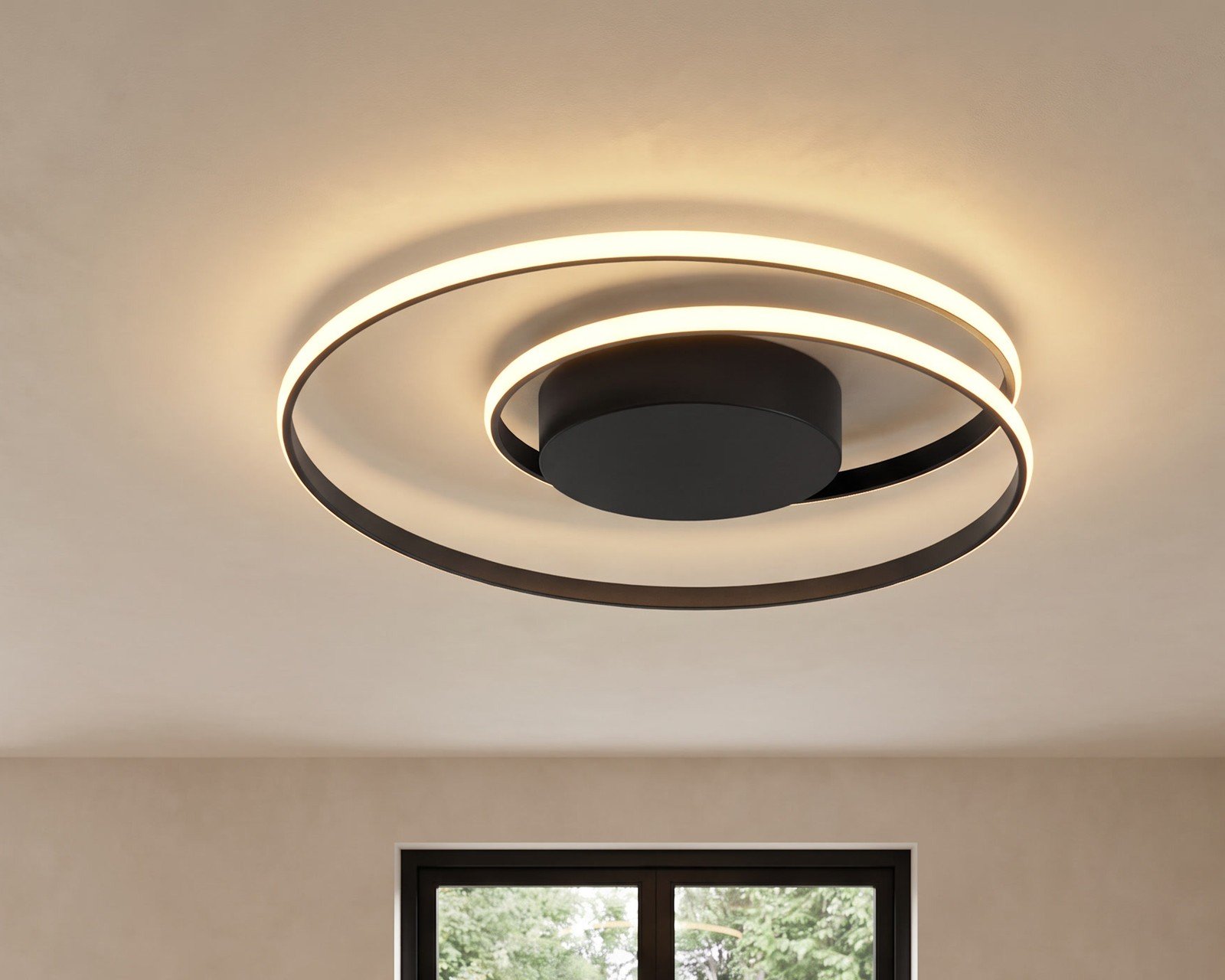 Spiral, a ring and spiral ceiling light, in a dining room