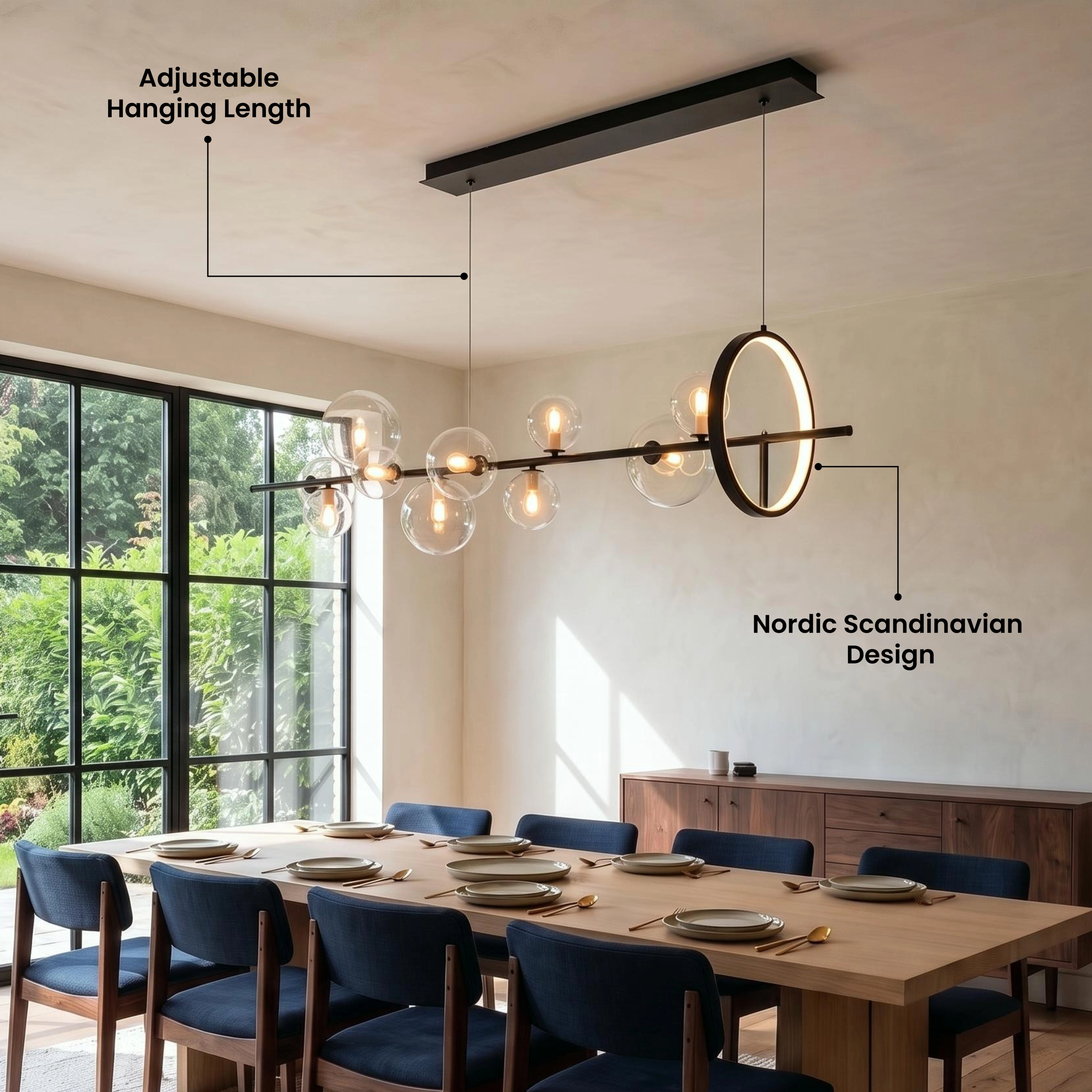 Bailey black-bar chandelier with clear glass orbs suspended in a living room with a sectional sofa