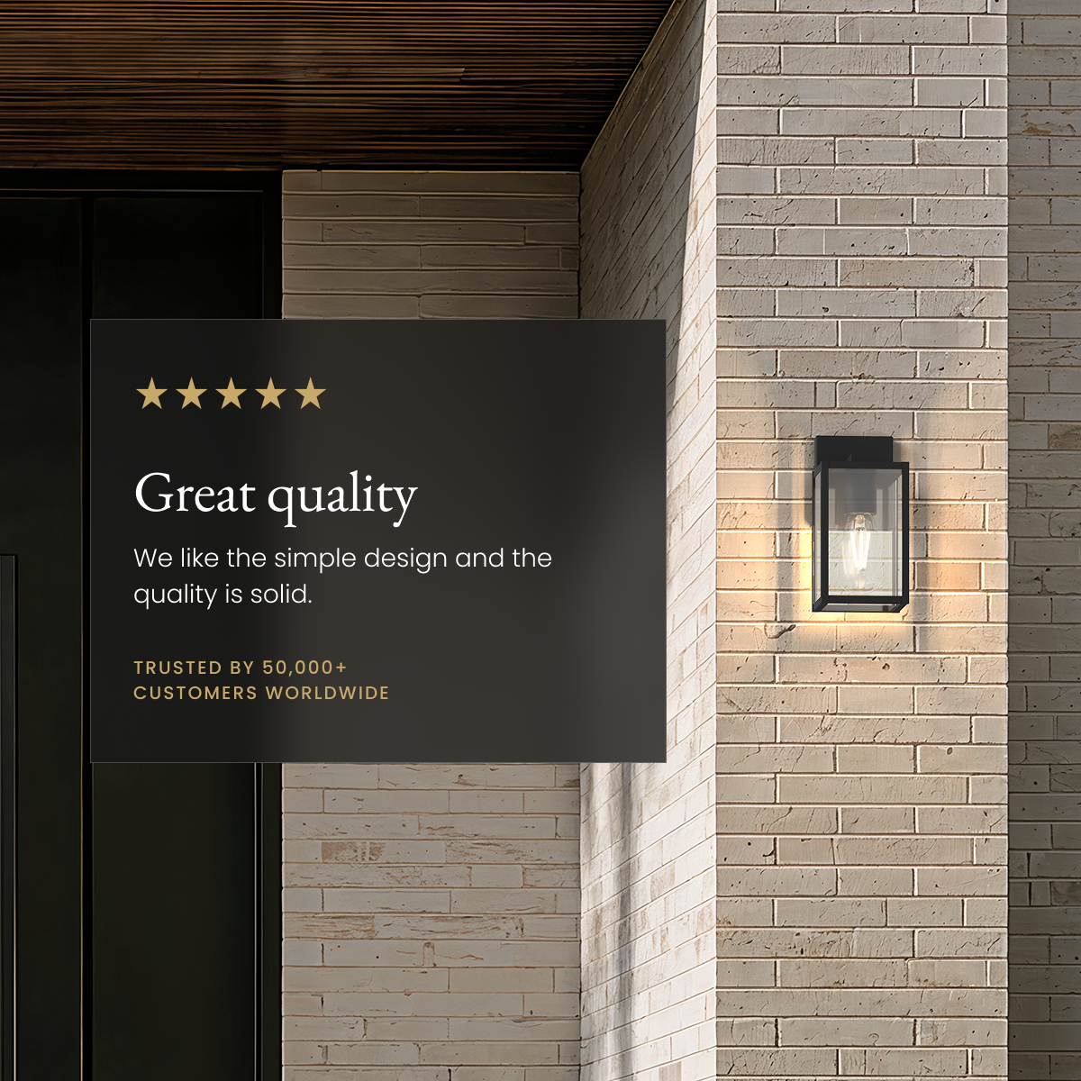 Rae black outdoor sconce with exposed-filament glow on a brick wall, five-star customer review