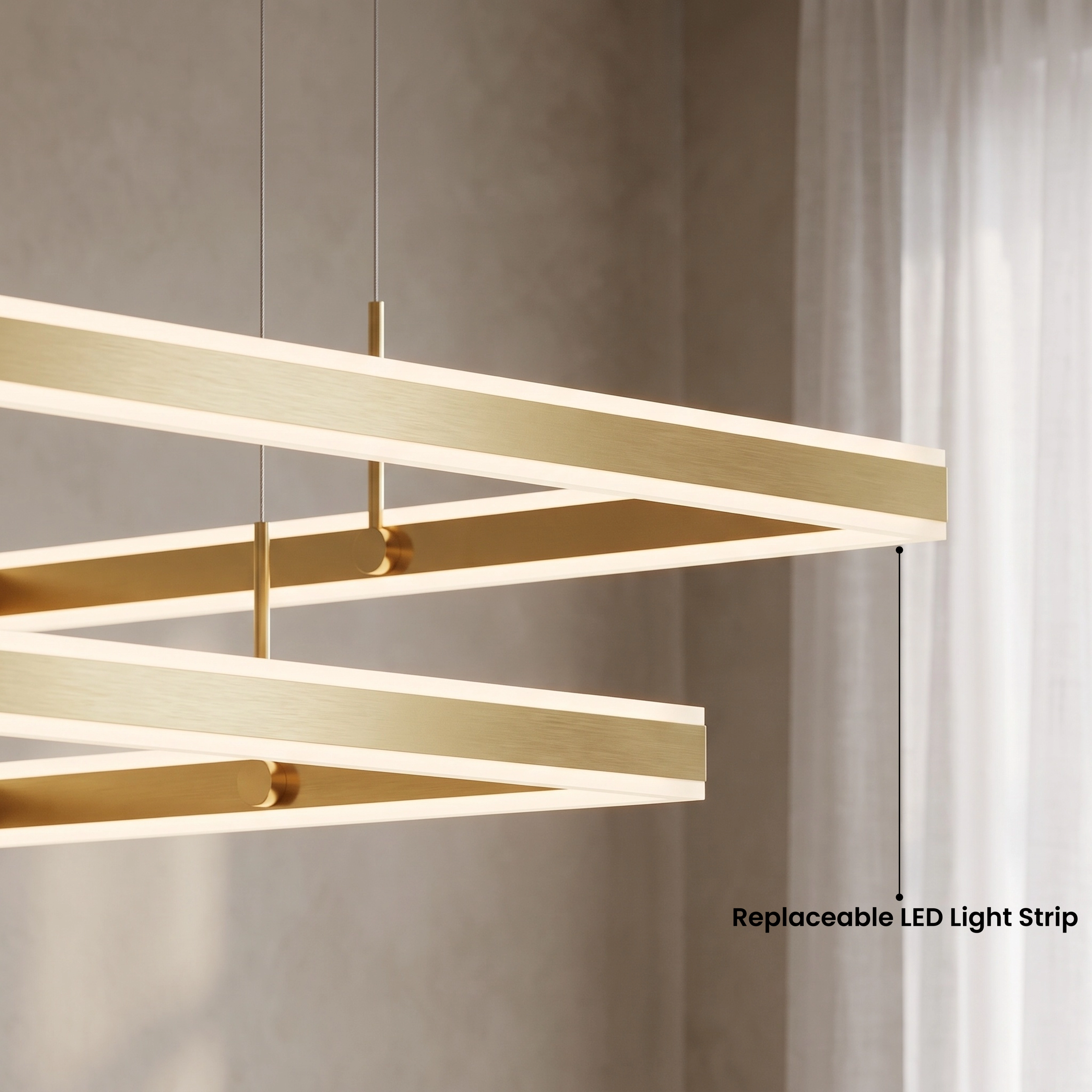 Arcade gold tiered square LED chandelier glowing warm white over a bed; available in two finishes