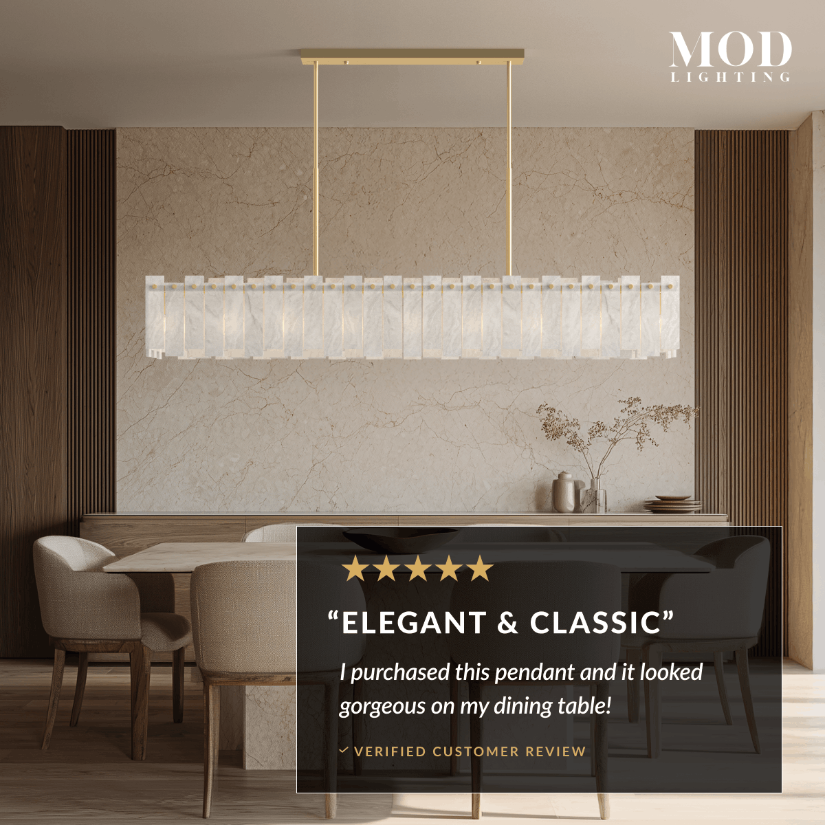 Velina Pendant gold linear alabaster bar of white panels over a dining table beside a stone wall
