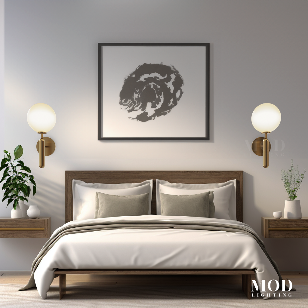 Angelica Sconce, pair of gold wall sconces with white globe shades flanking a bed
