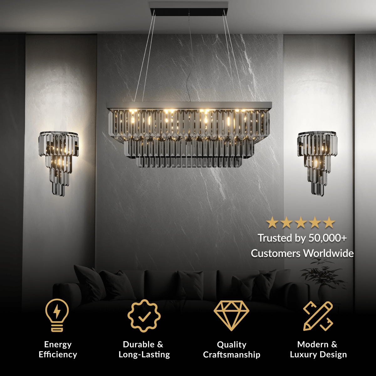 Umbra crystal chandelier, rectangular black frame with tiered fringe crystals, over a dark sofa against marble