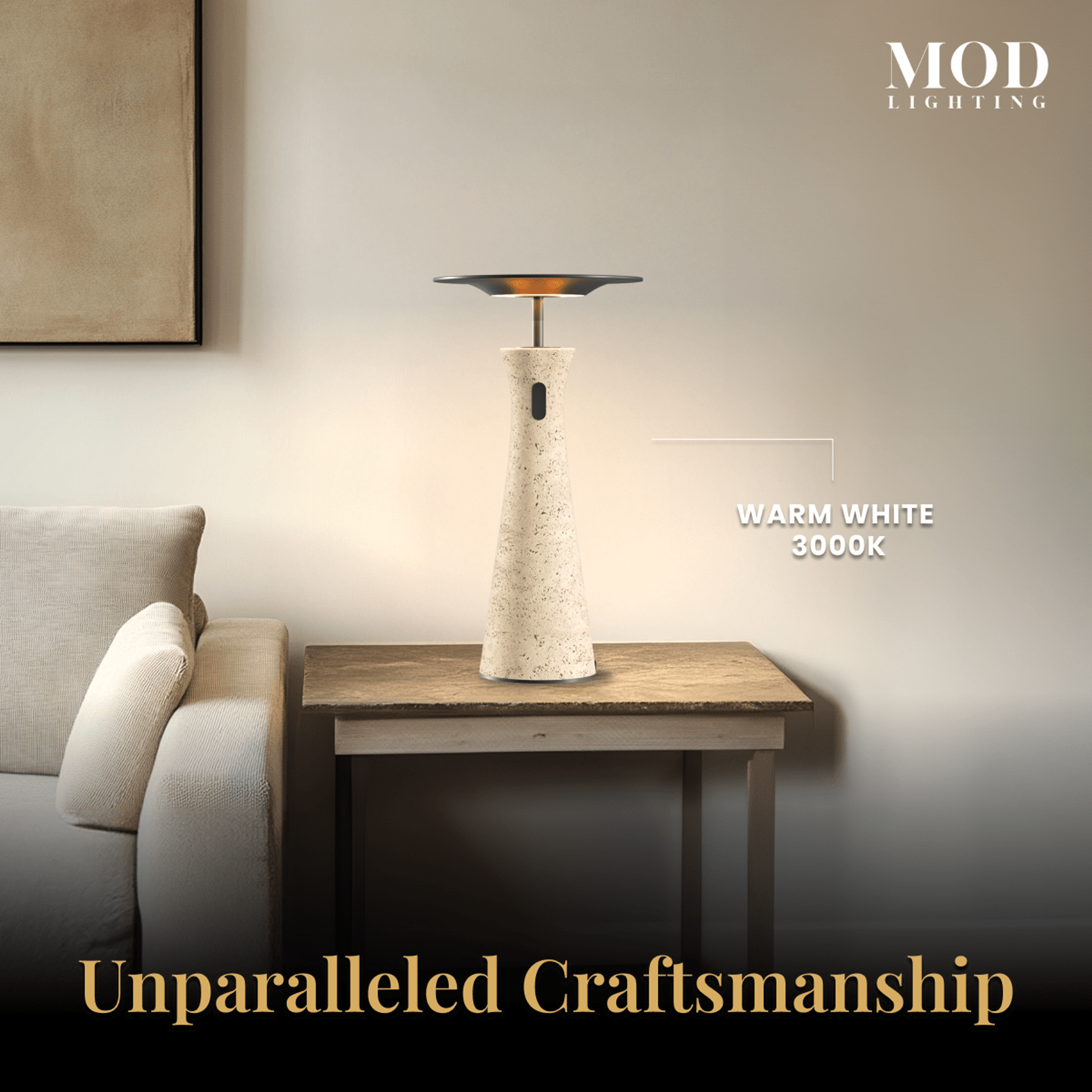 Dara tapered travertine table lamp glowing warm white on a wood console in a living room