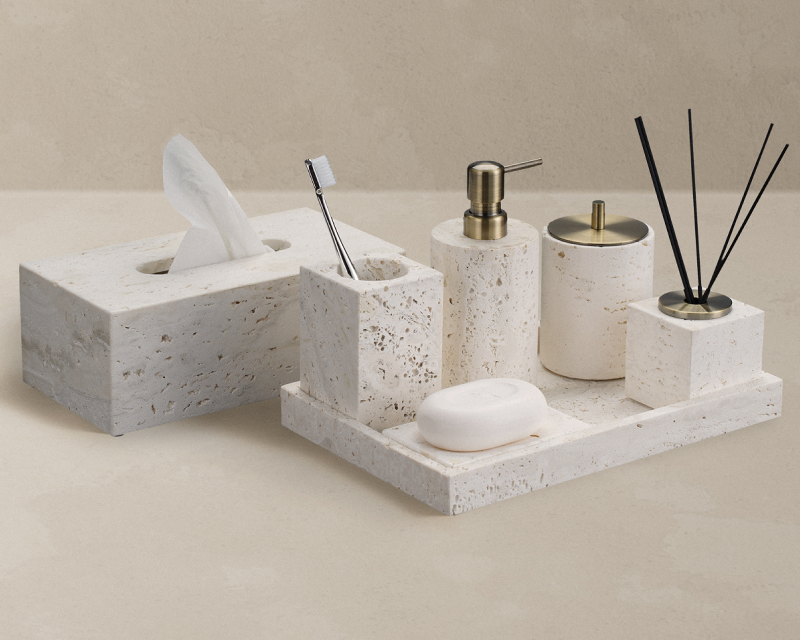 Golden Travertine stone bath set on a bathroom counter