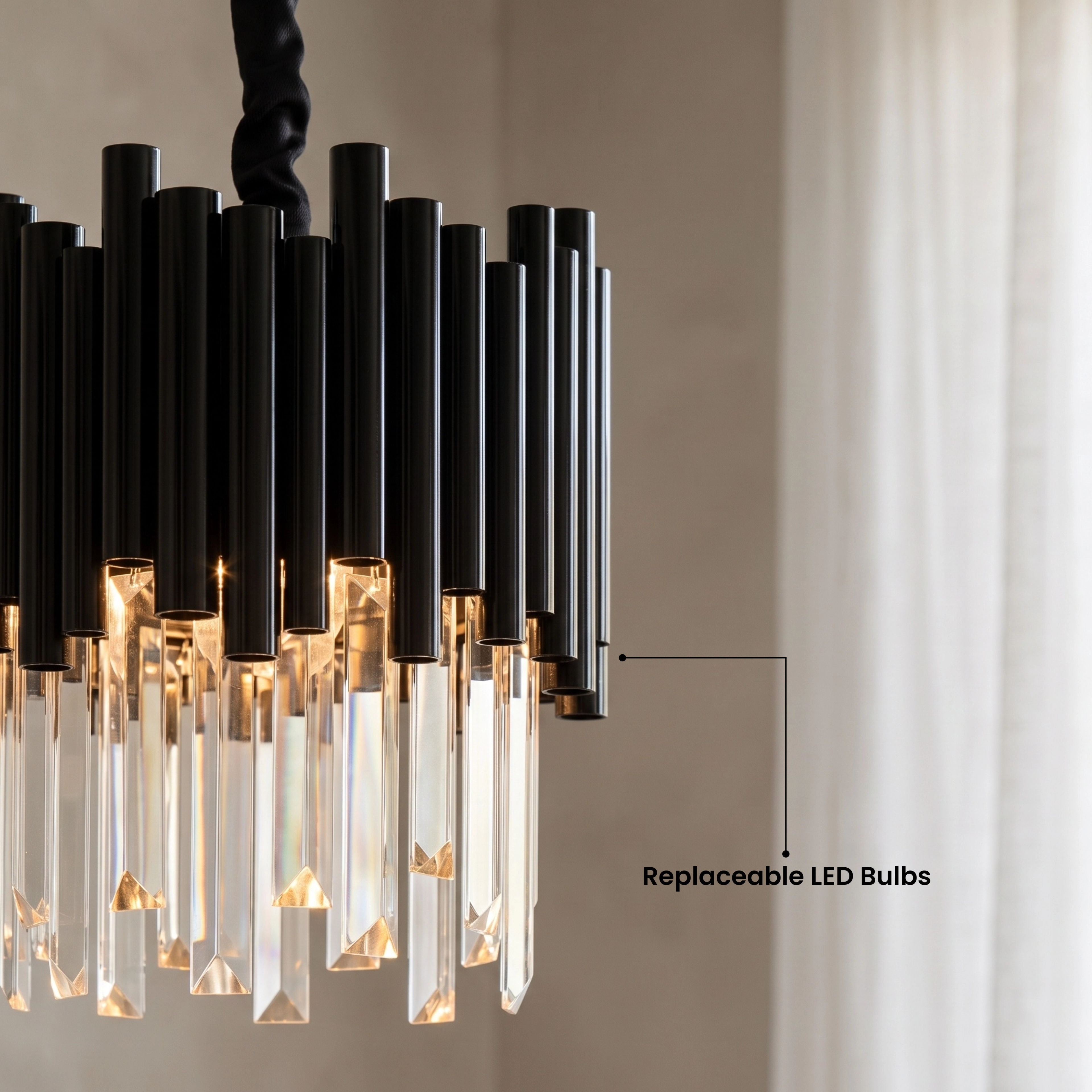 Mini Obsidian black crystal pendants over a dining table in a green-panelled room, warm white 3000K