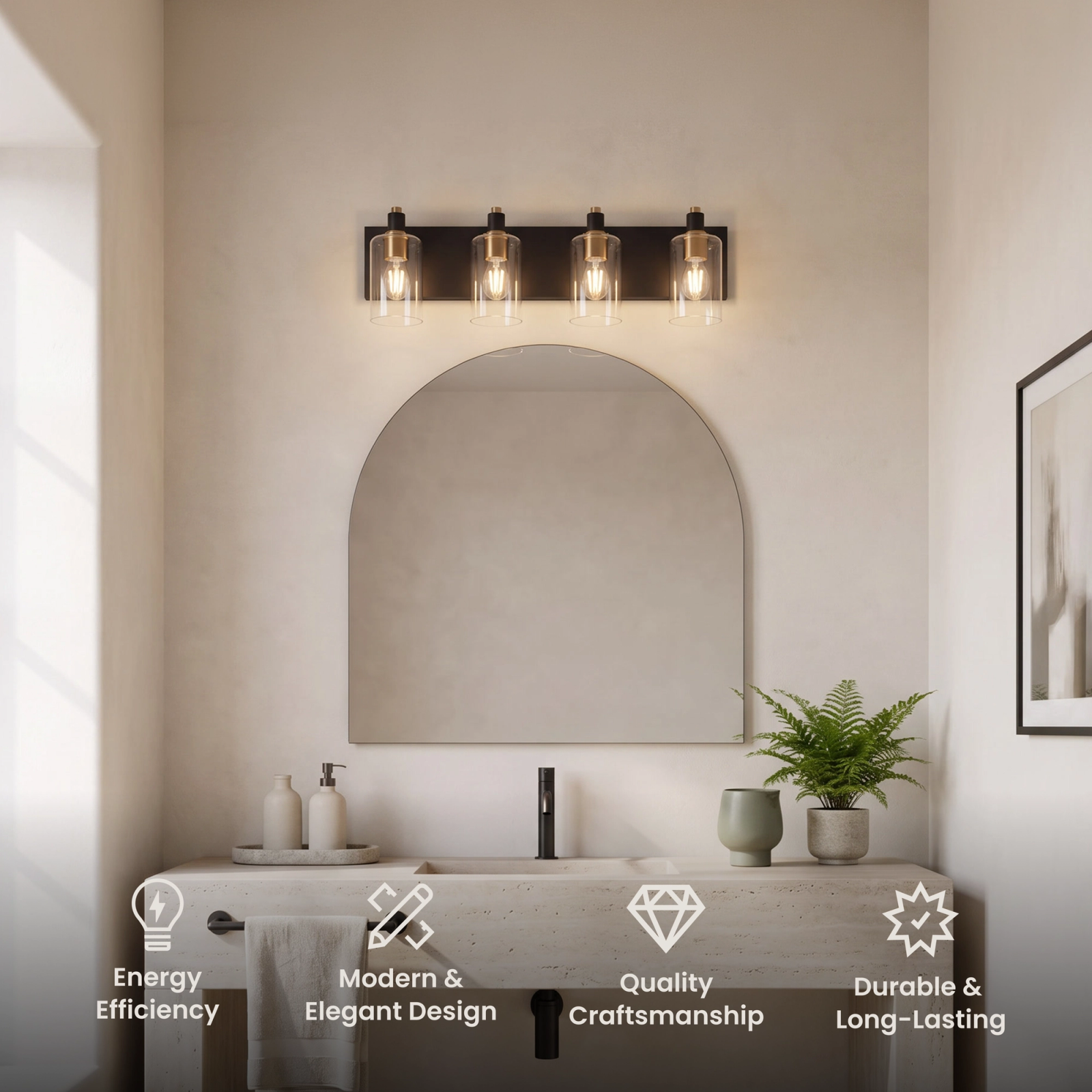 Hazel bathroom light, four clear glass shades on a matte black bar with gold accents above a black-framed mirror