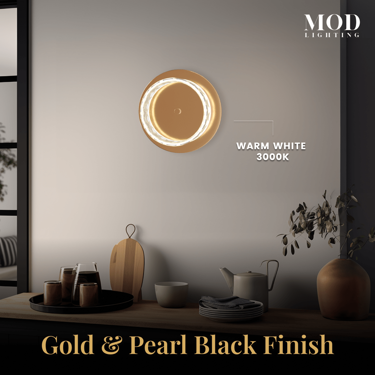 Emma round wall sconce, gold and pearl-black crystal ring in warm white 3000K, glowing above a console table