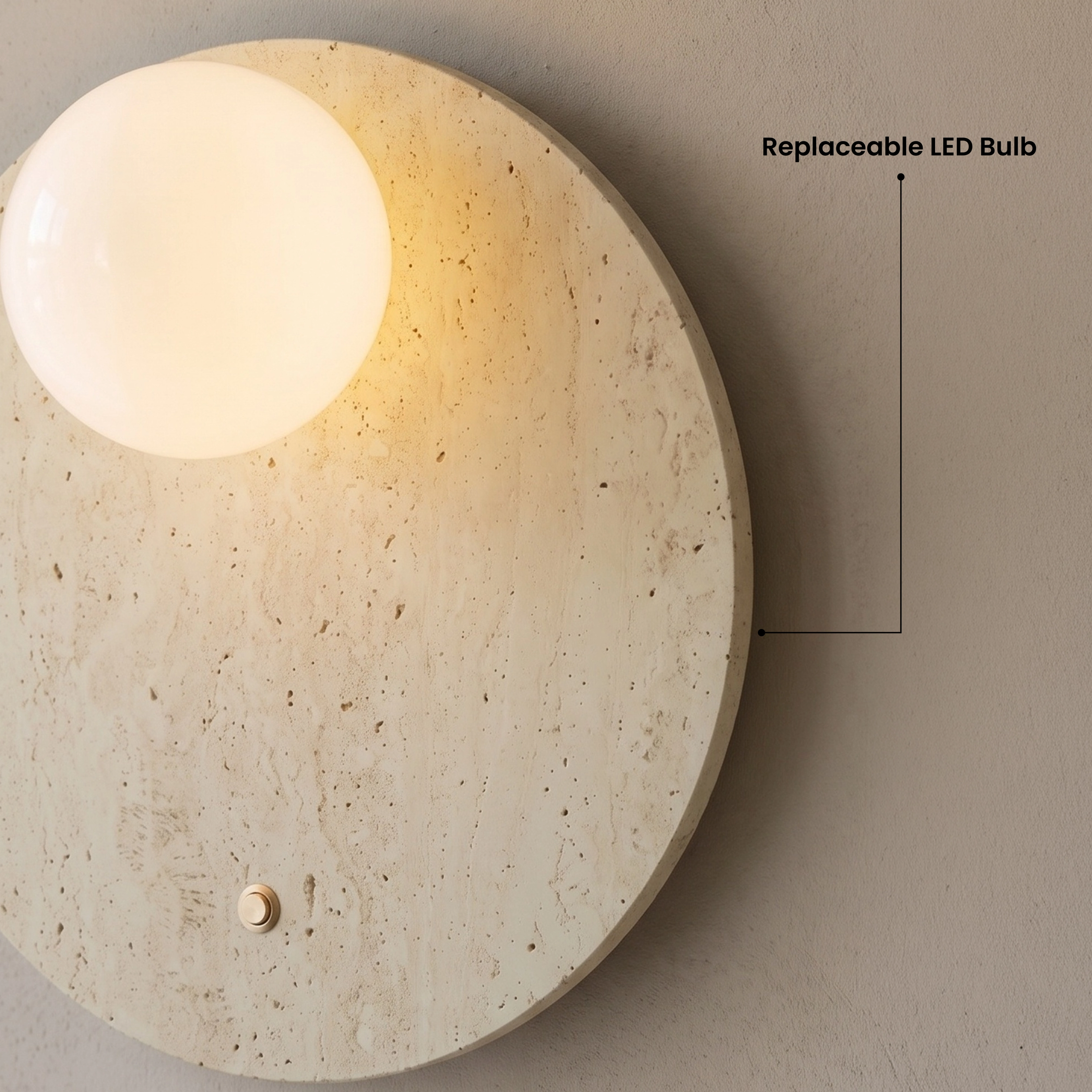 Arabella Sconce travertine stone wall lights, stone discs with glass orbs in a stone-clad room, with a "Very cozy" review