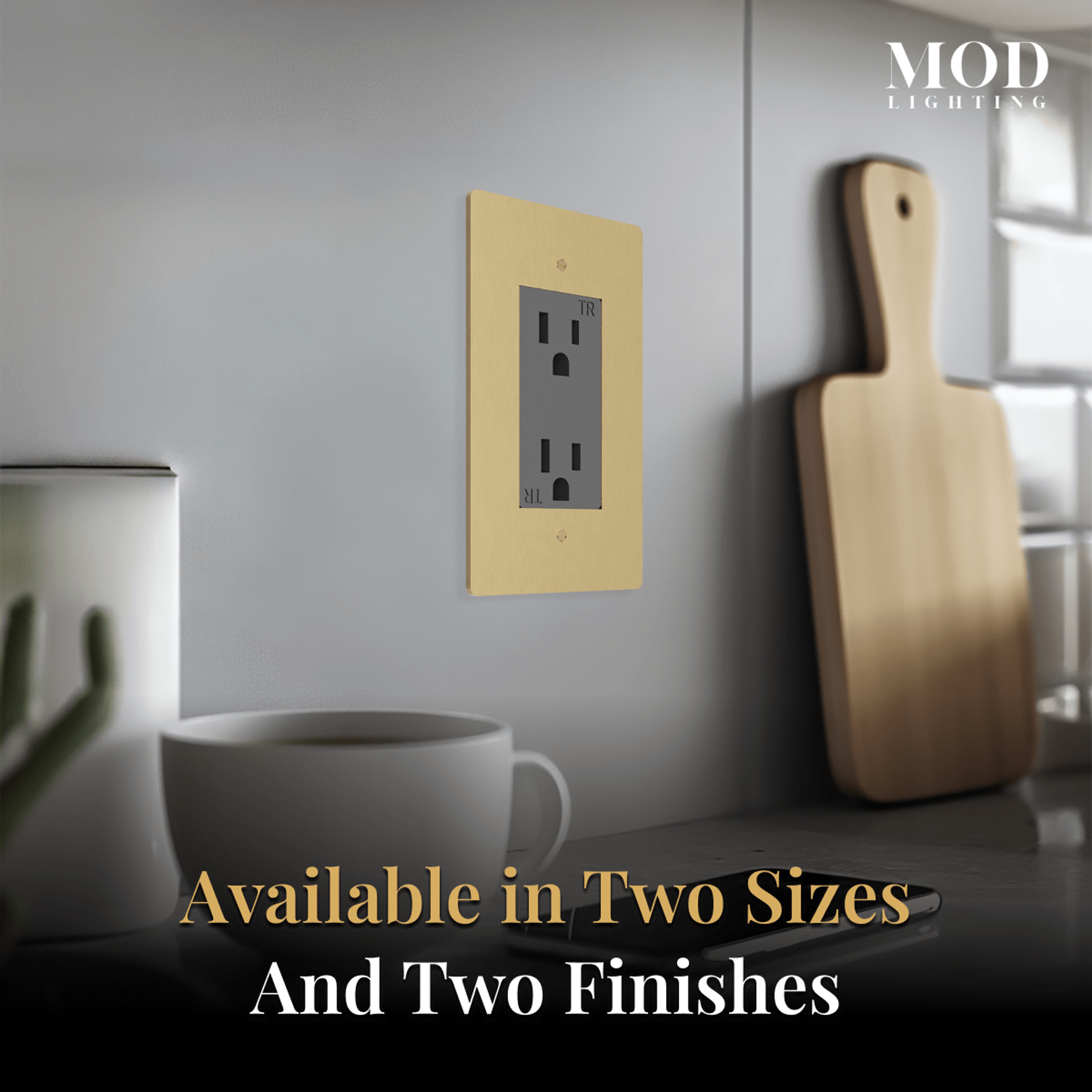 Modern Wall Outlet brushed-gold plate on a grey kitchen wall, noted in two sizes and two finishes