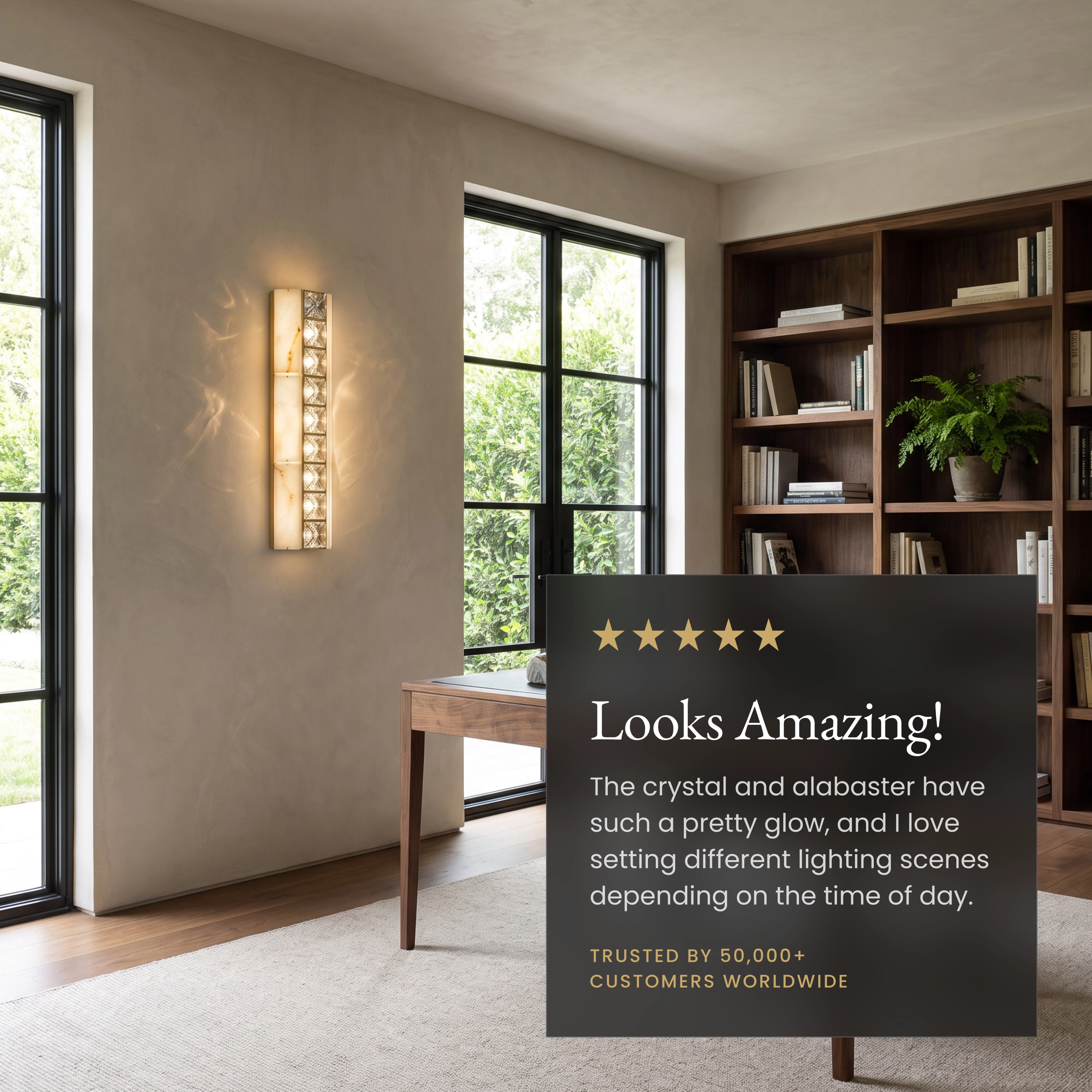 Seraphine Sconce Smart crystal wall sconce in a study beside a five-star customer review