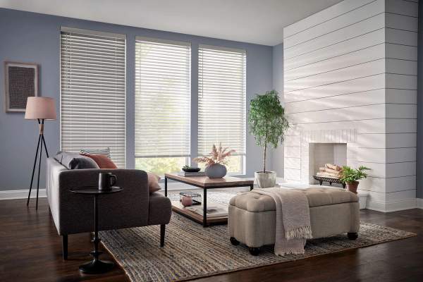 White faux wood blinds in living area