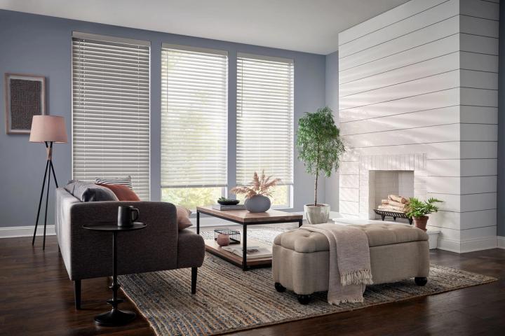 White faux wood blinds in living area