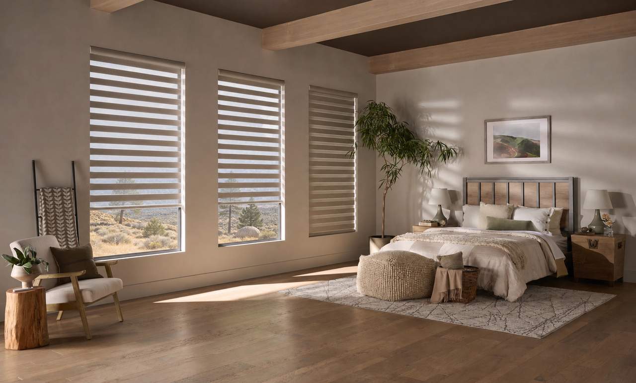 Banded shades framing a high-desert bedroom view