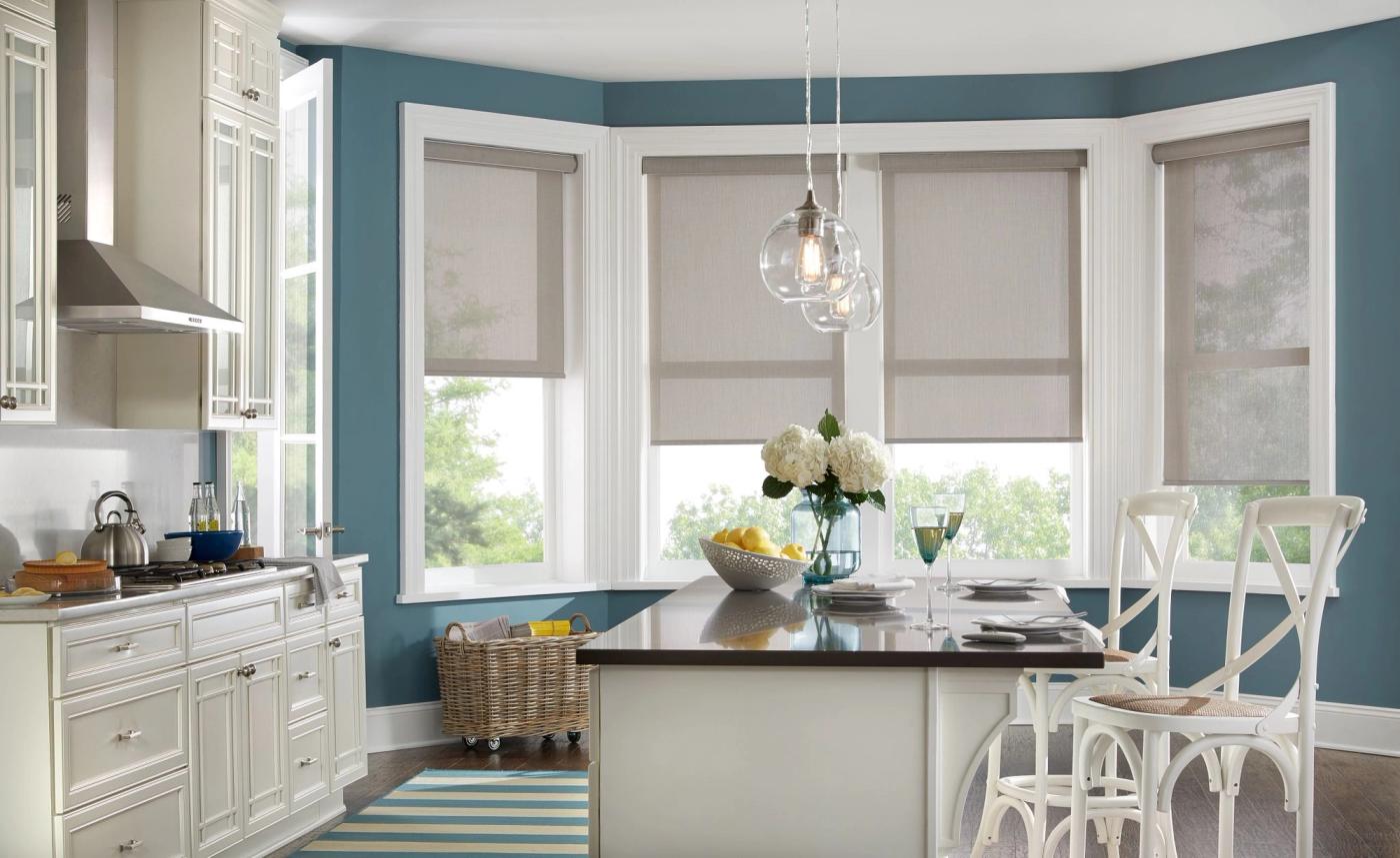 Motorized roller shades in kitchen
