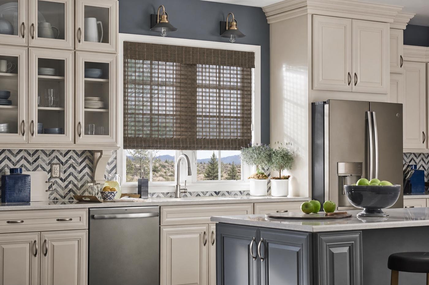 Natural woven shades in kitchen over sink