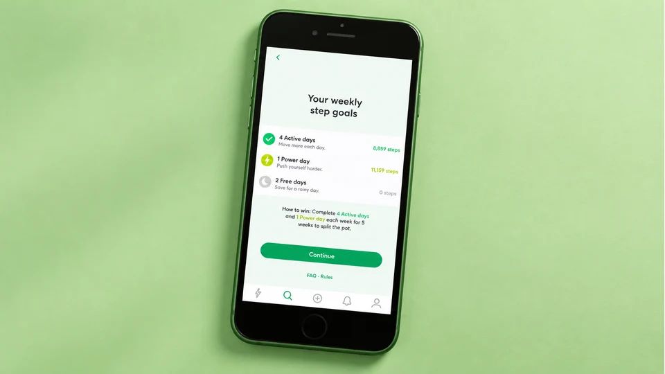 StepBet: Walk, Get Active, Win app screen displayed on a phone.