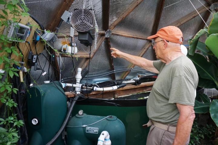 Gary pointing out the pond filter system