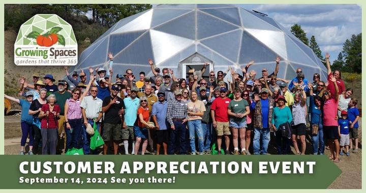crowd of people standing in front of a Growing Dome making funny faces at the camera