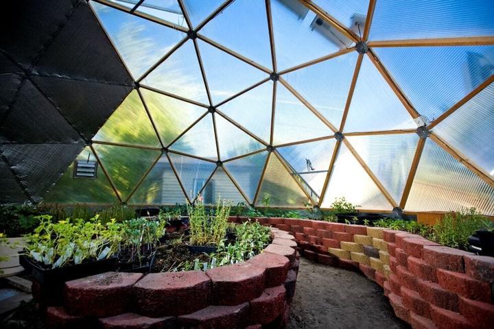 Growing Dome greenhouse with pavestone beds